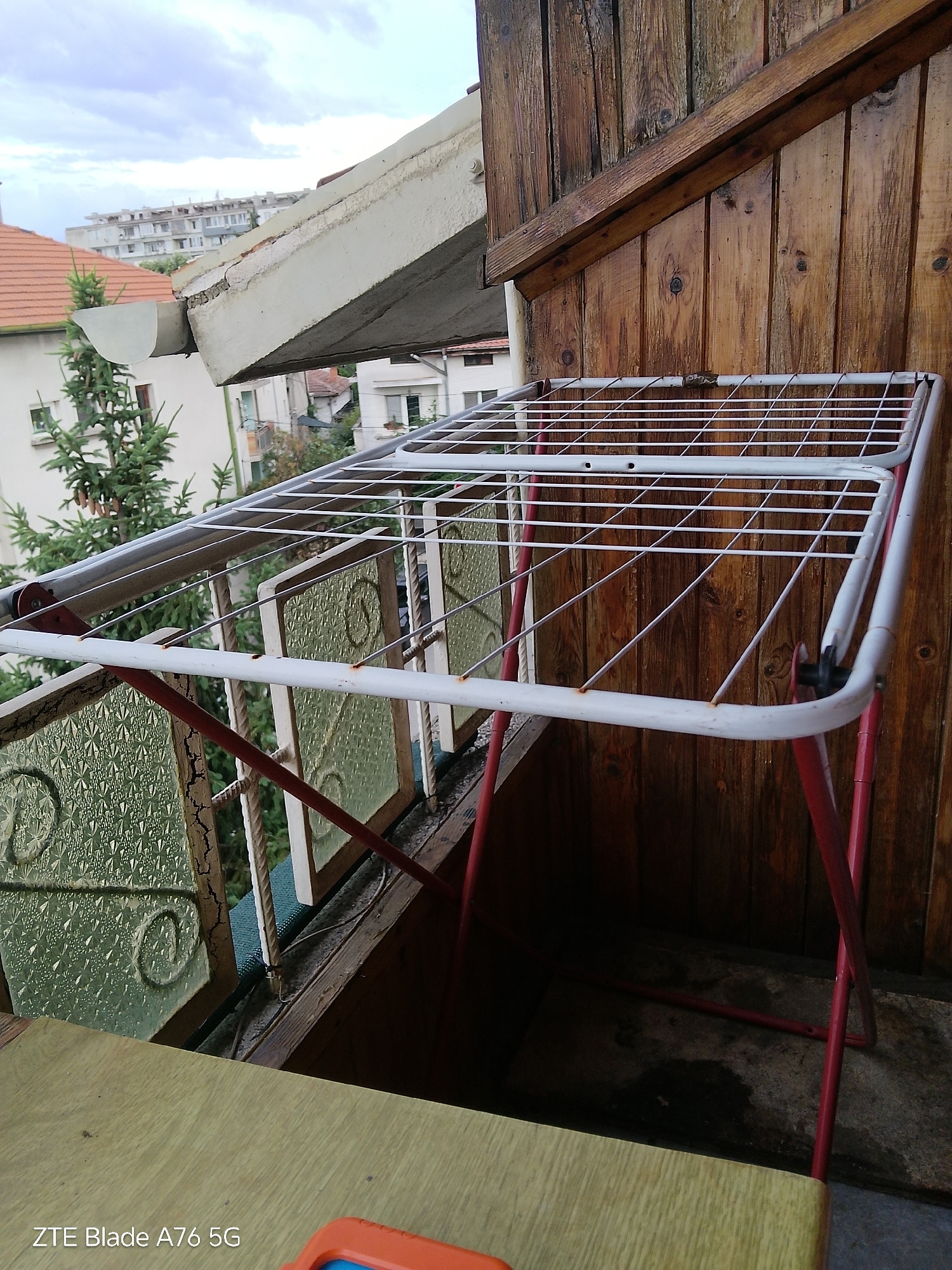 Child's playtime documented in Bulgarian home over summer afternoon