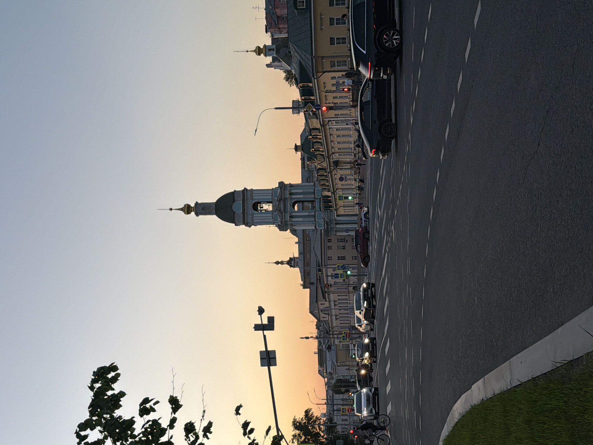 Evening street life captured near Moscow's Seven Sisters tower