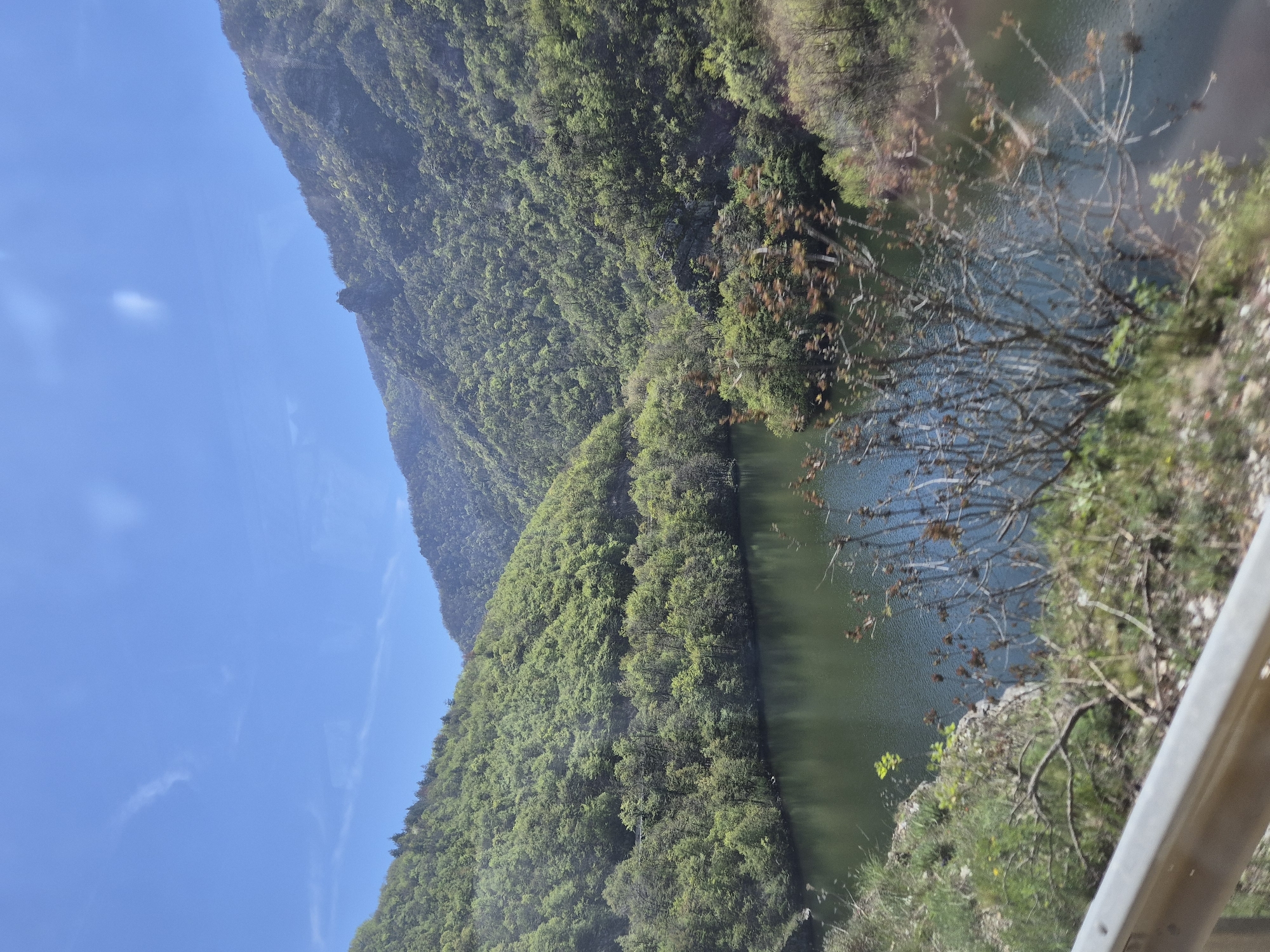 Serene mountain landscape with water body documented in Mihalkovo
