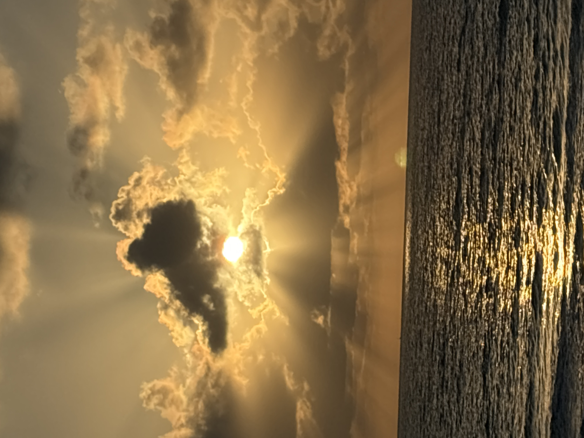 Mediterranean sunset from Tel Aviv coastline with dramatic clouds
