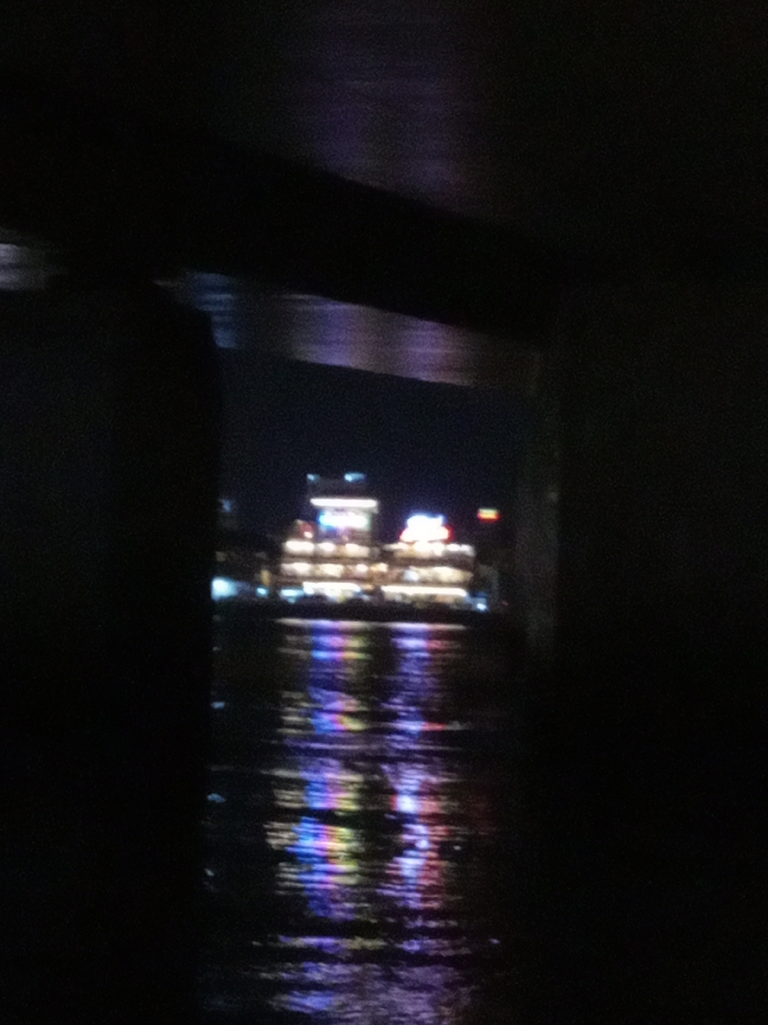 Nighttime waterfront building photographed in Trang Vietnam heritage area