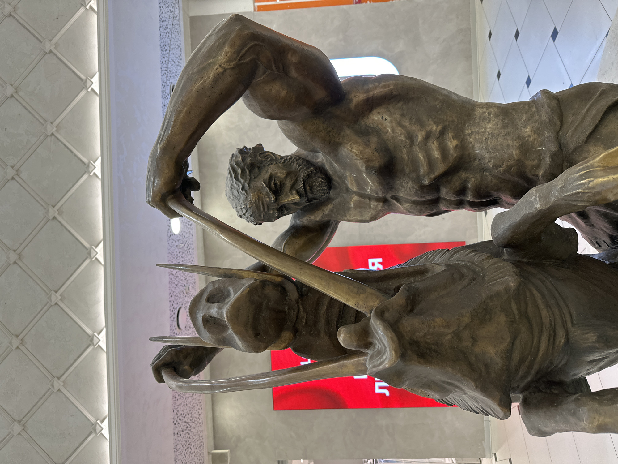Bronze sculpture shows man wrestling boar in Yekaterinburg