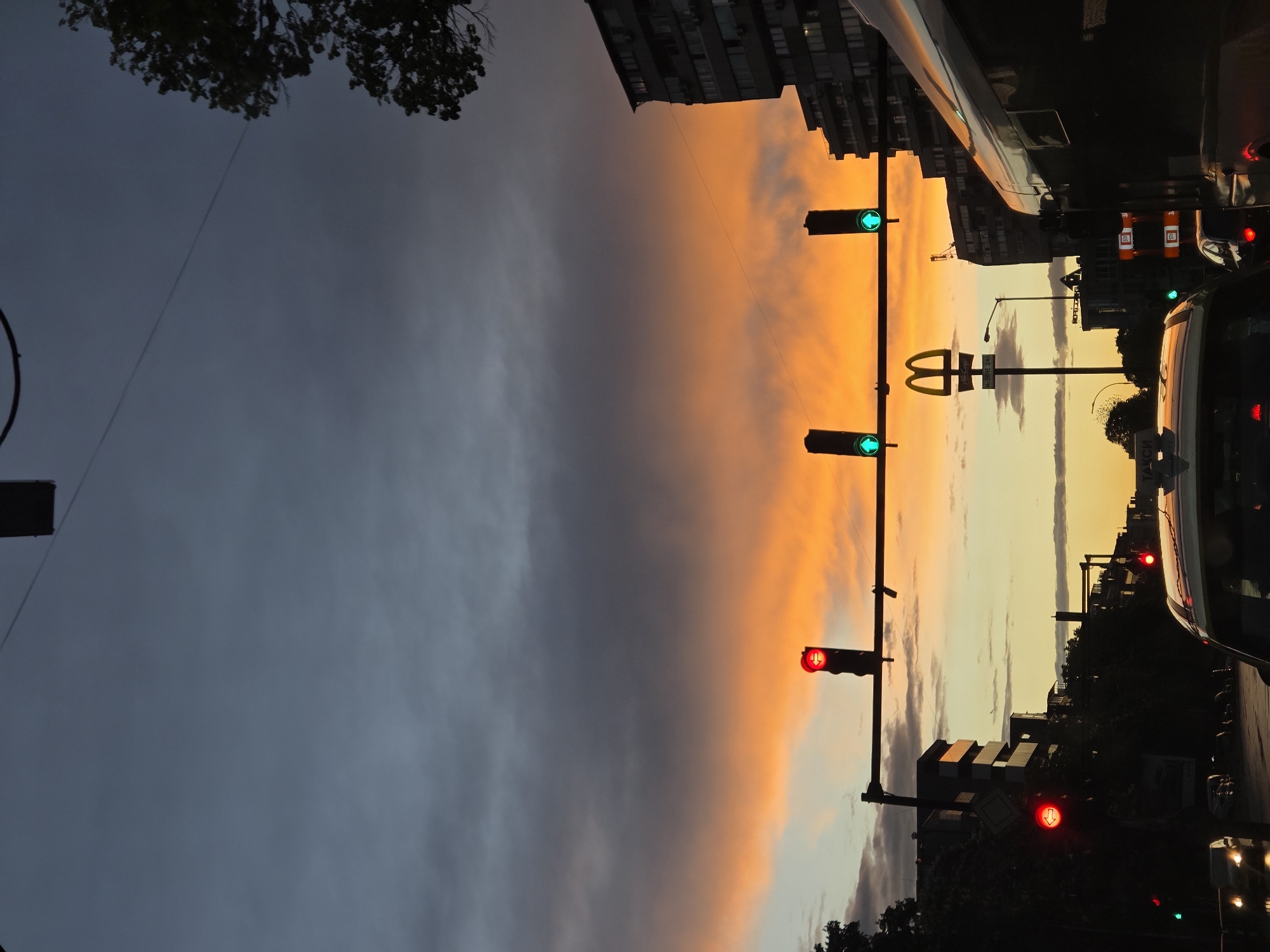 Dramatic sunset creates striking sky contrast over Varna streets