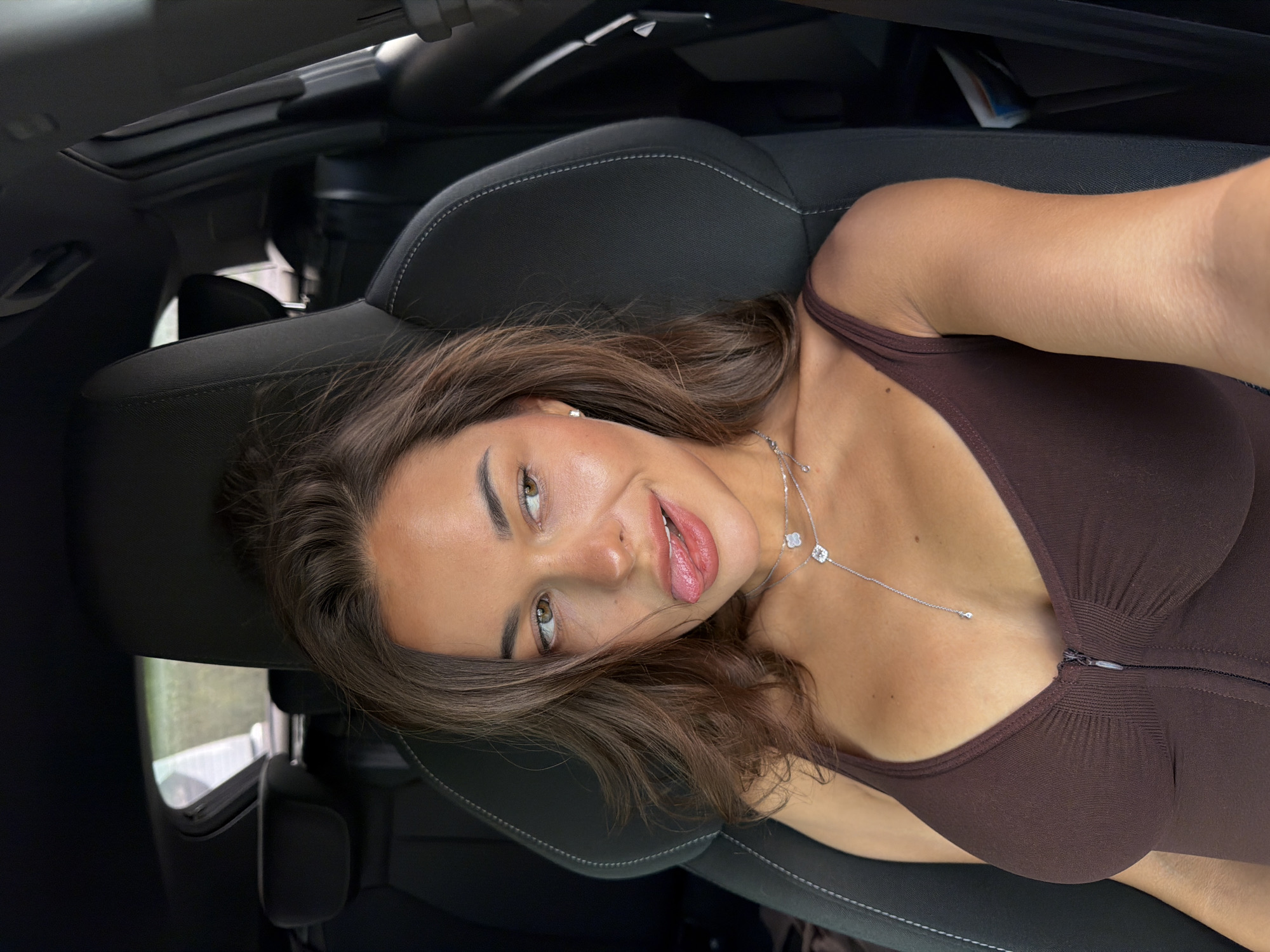 Woman takes playful car selfies in Krasnoyarsk