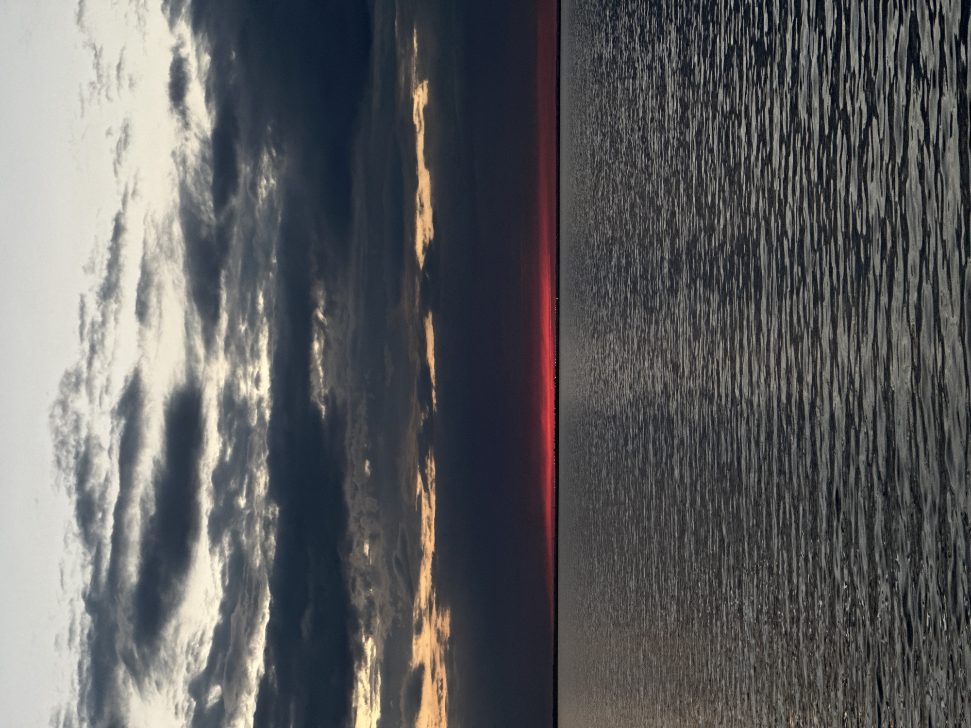 Sunset lake scene documented in Kokshetau, Kazakhstan
