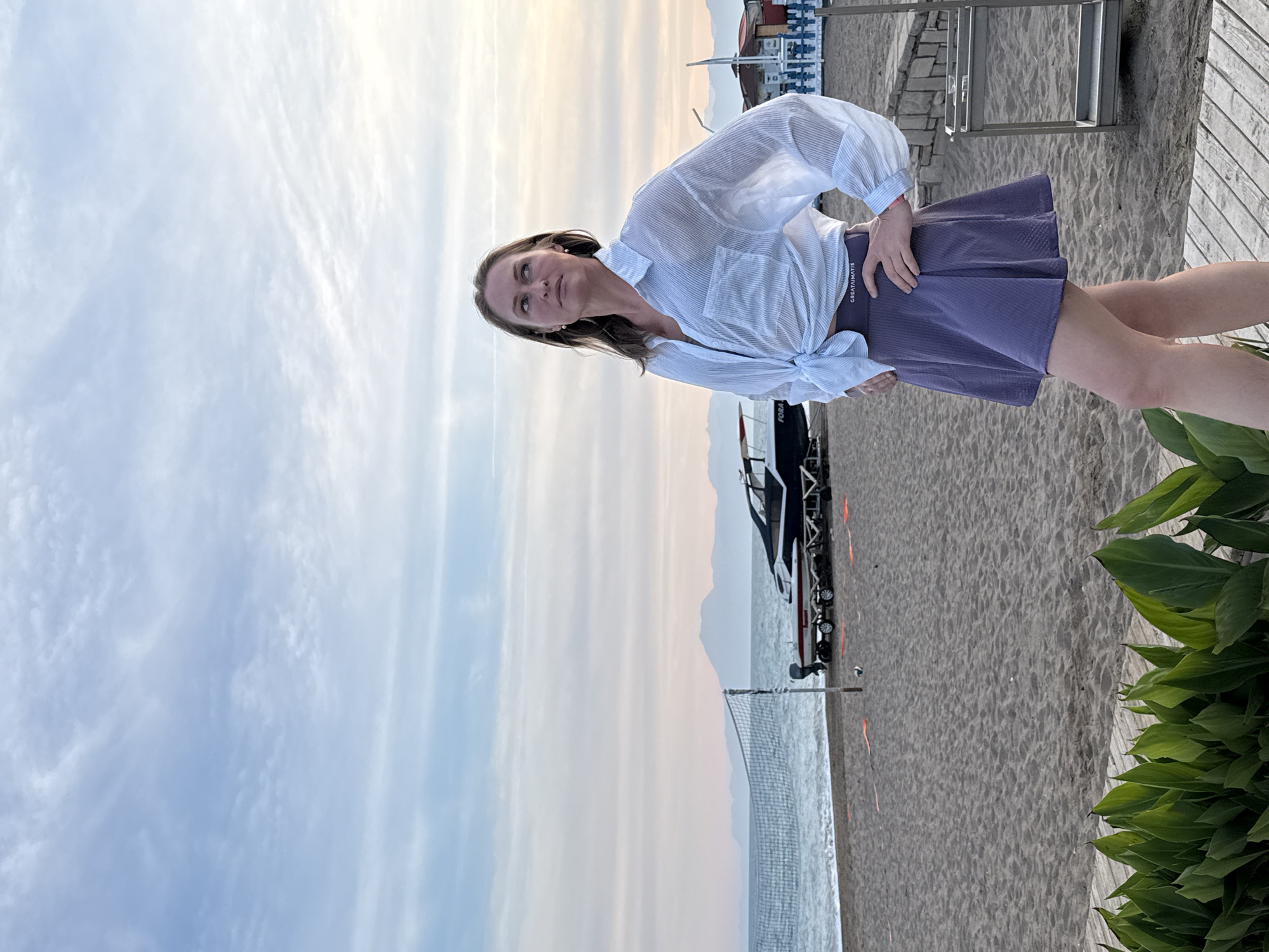 Woman photographed at sunset beach resort in Serik, Turkey