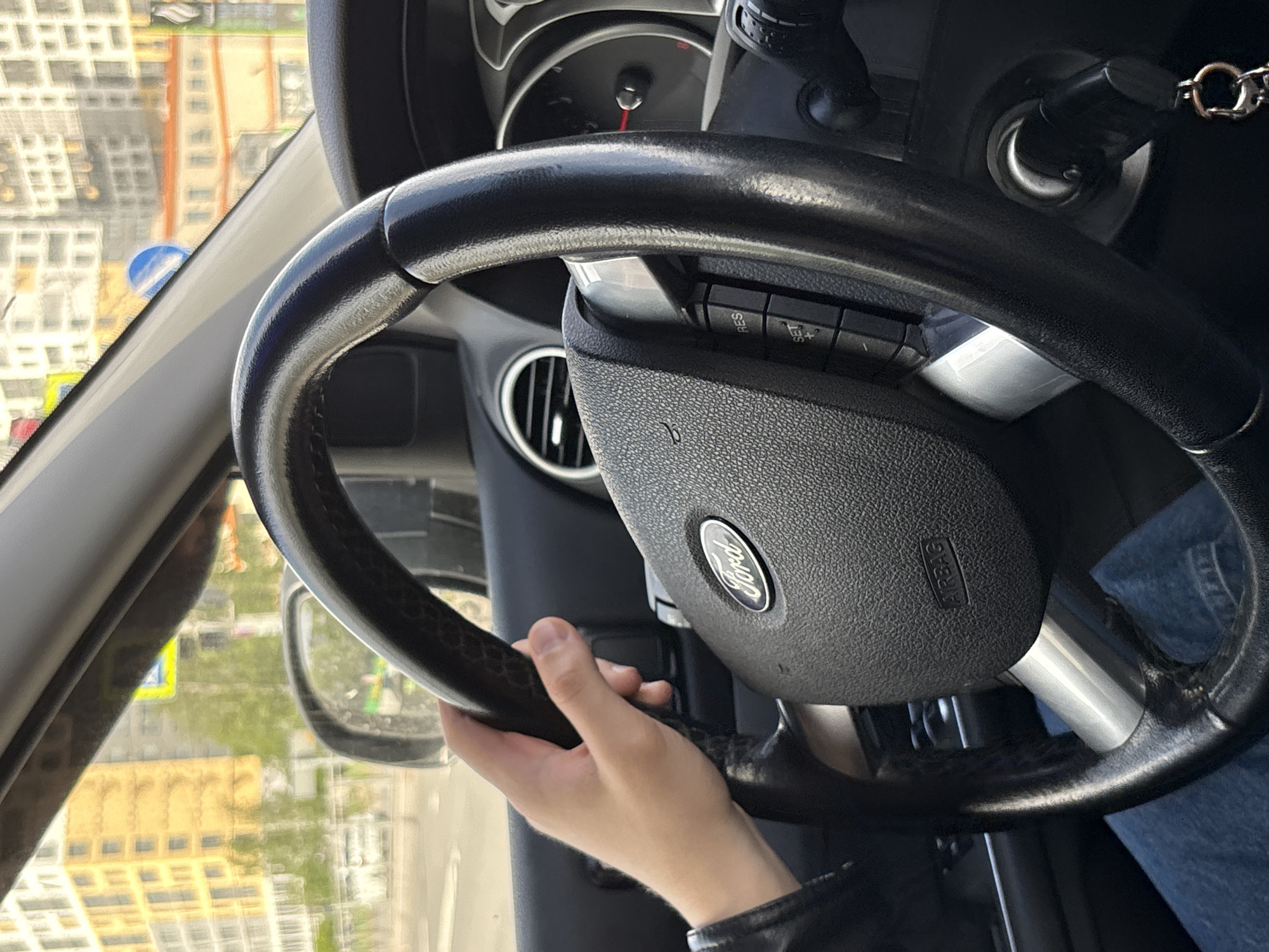 Driver operates Ford vehicle through Saint Petersburg streets