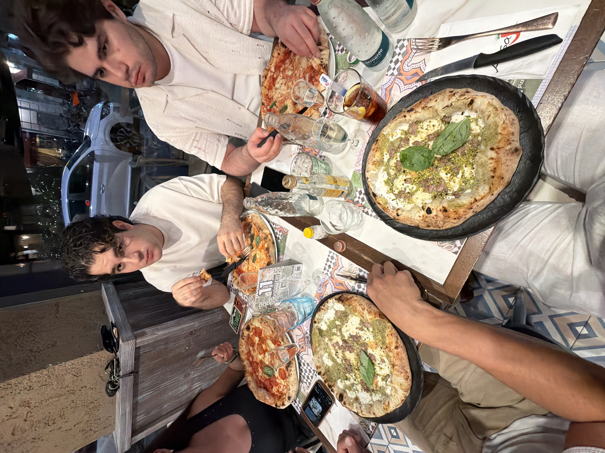 Pizza night in Milan with mochi and handheld games on the side