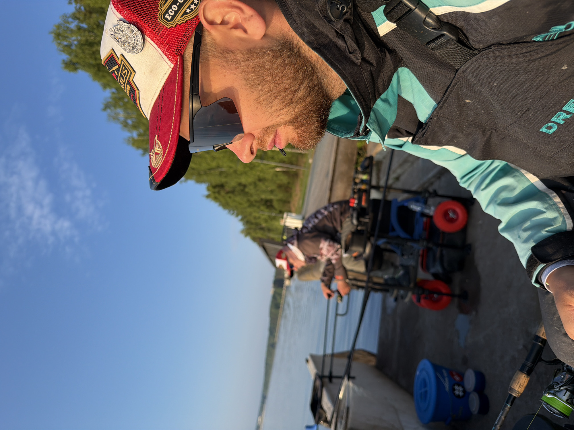 Fishing scene along Chaikovsky waterway on sunny June day