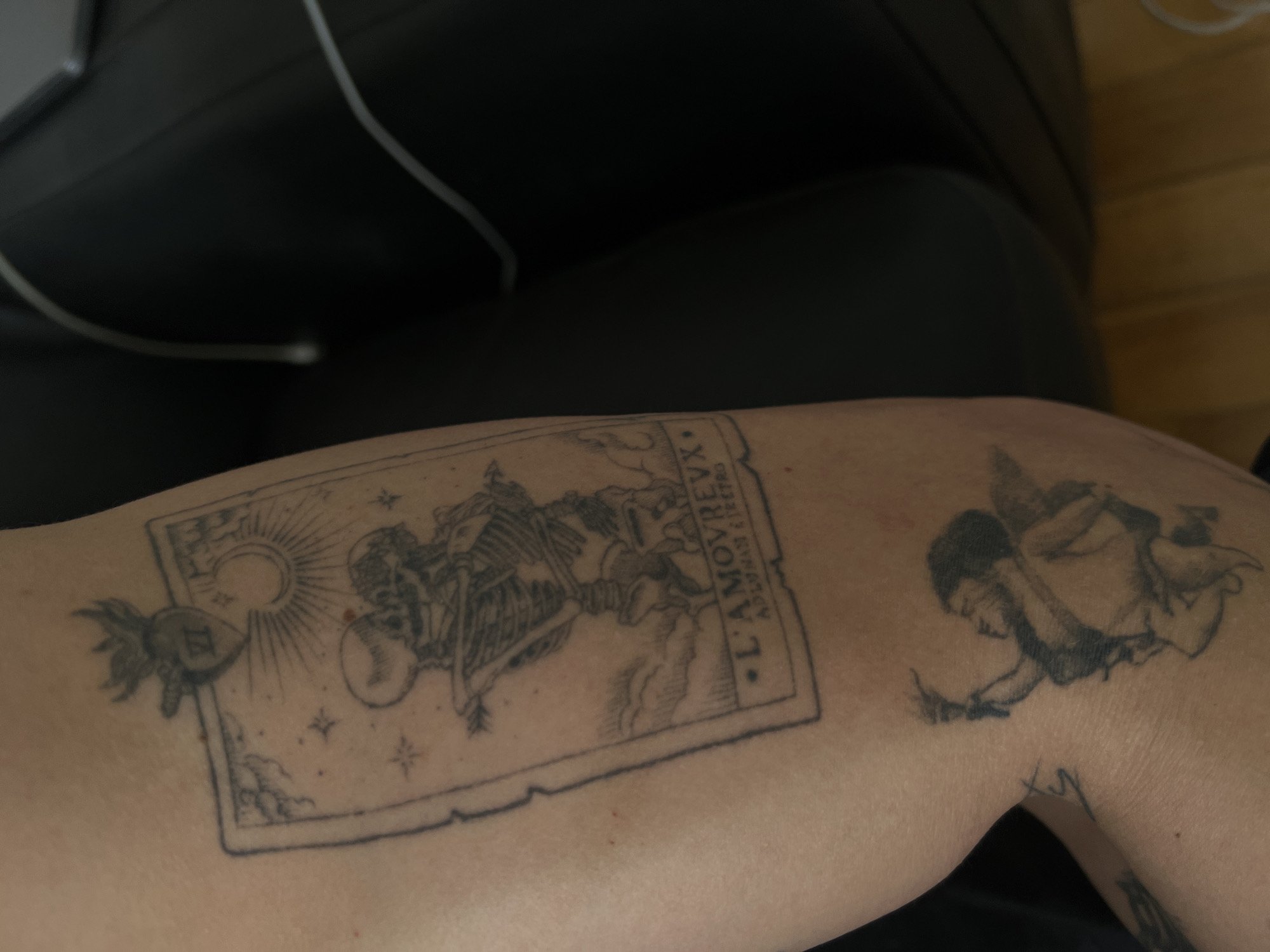 Tattooed arm photographed in close-up in Mexico City