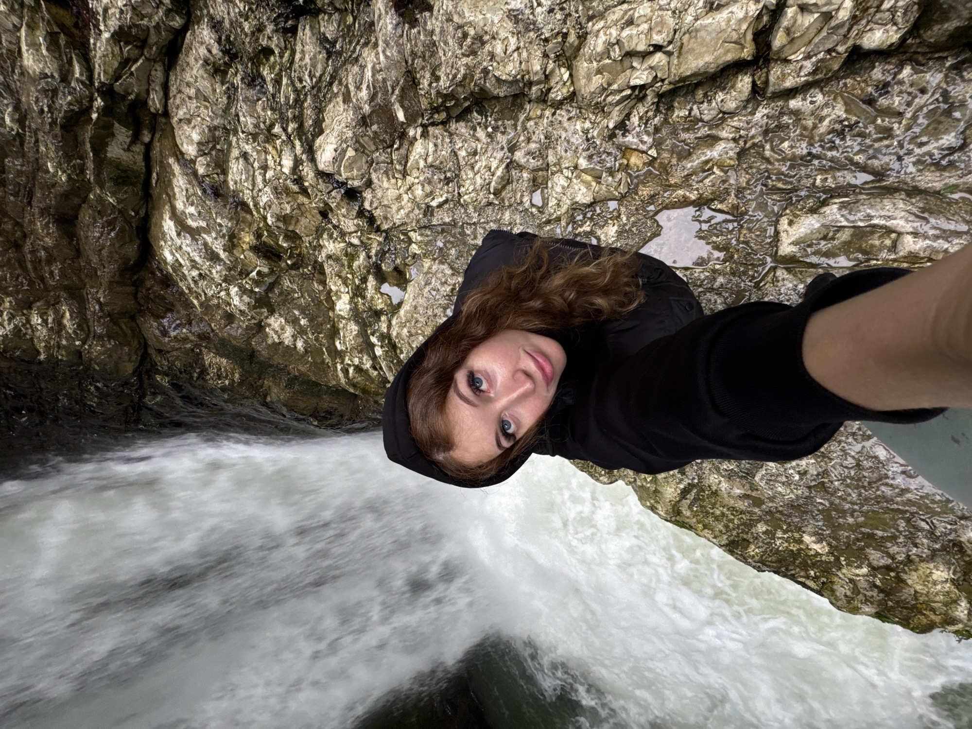 Tourist photographs waterfall and caged bears in Tsabal, Abkhazia