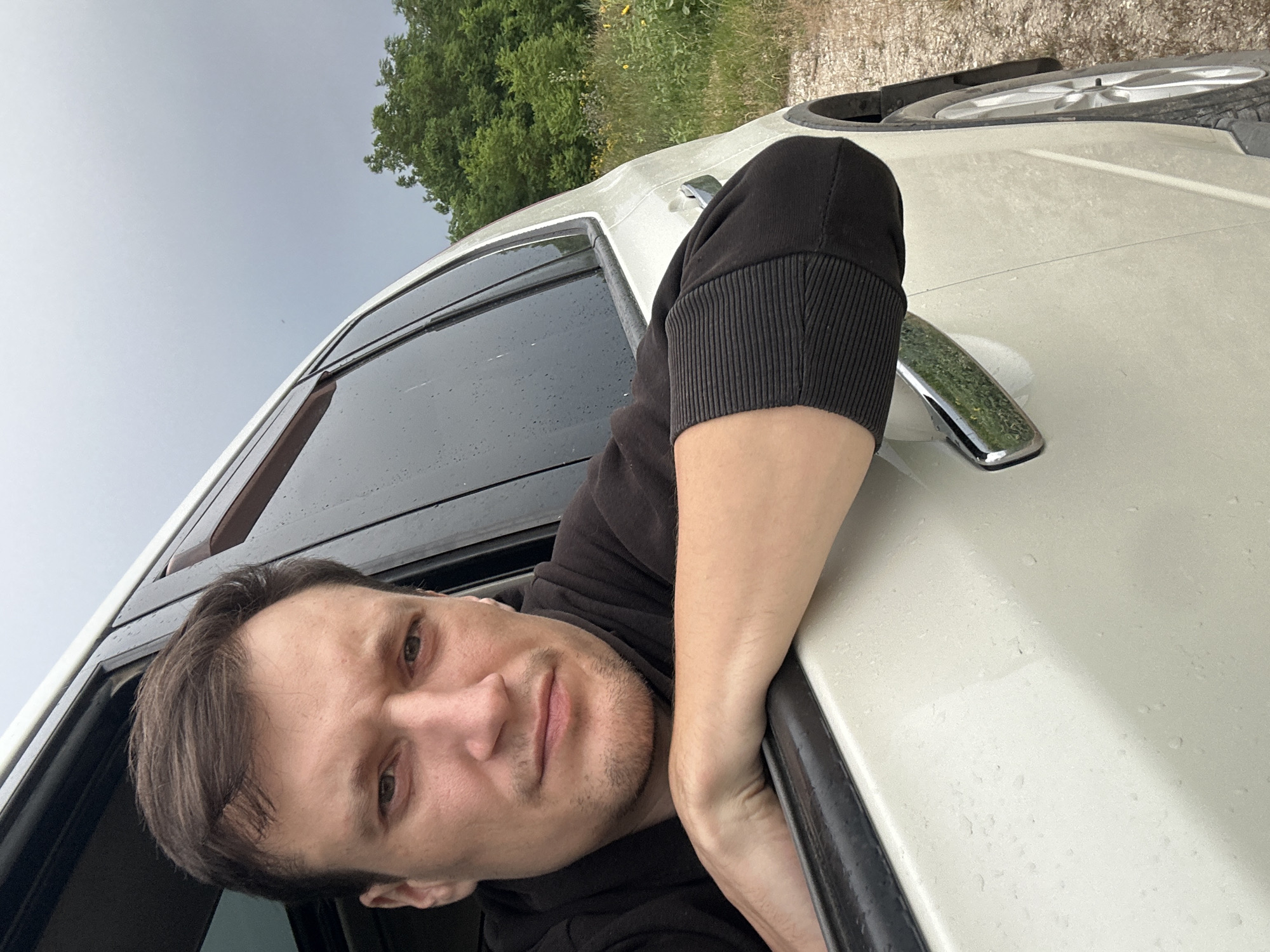 Roadside stop near wind turbine and comms tower, Korchivka