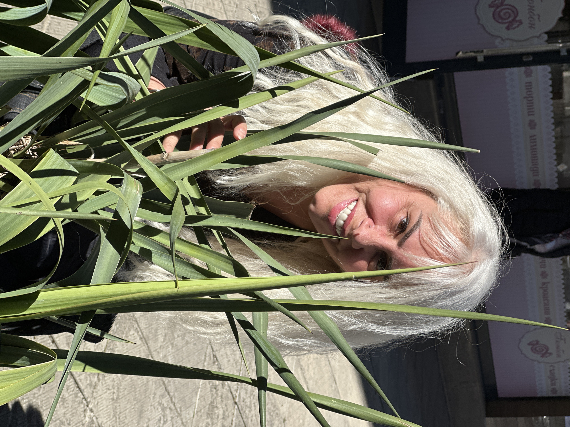 White-haired woman photographed around Sofia parks and streets