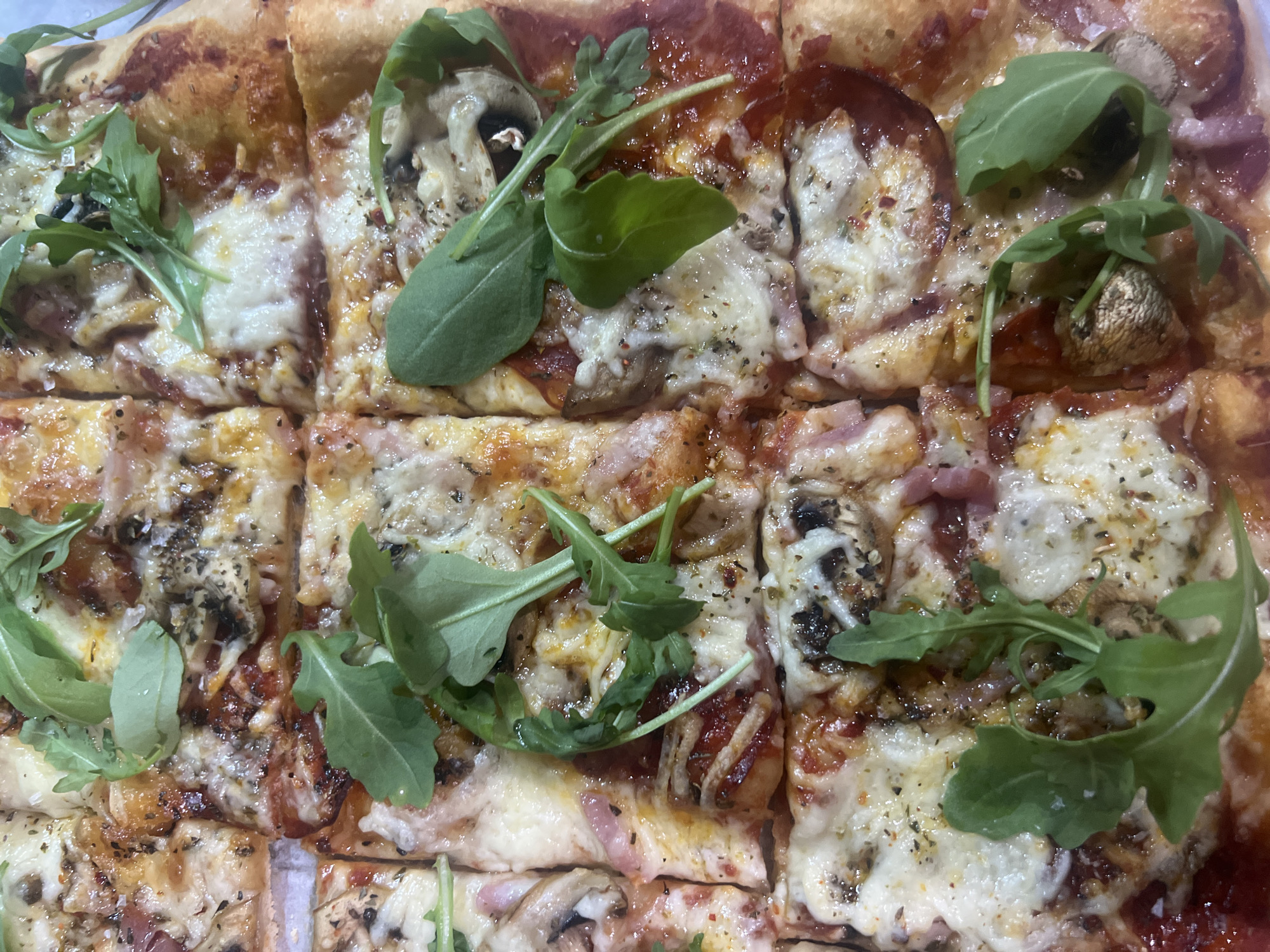 Everyday moments documented in Mollet Del Vallès: pizza, tiles, portrait