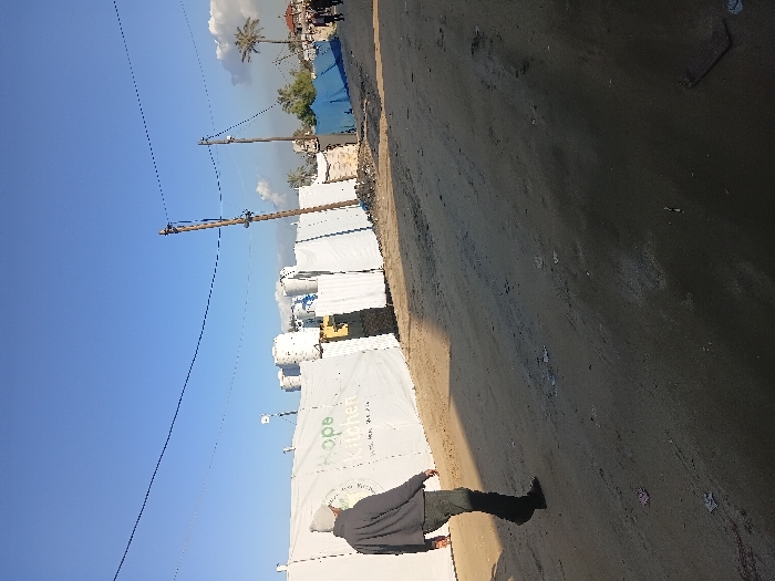 Daily life scenes documented across Khan Yunis streets and markets