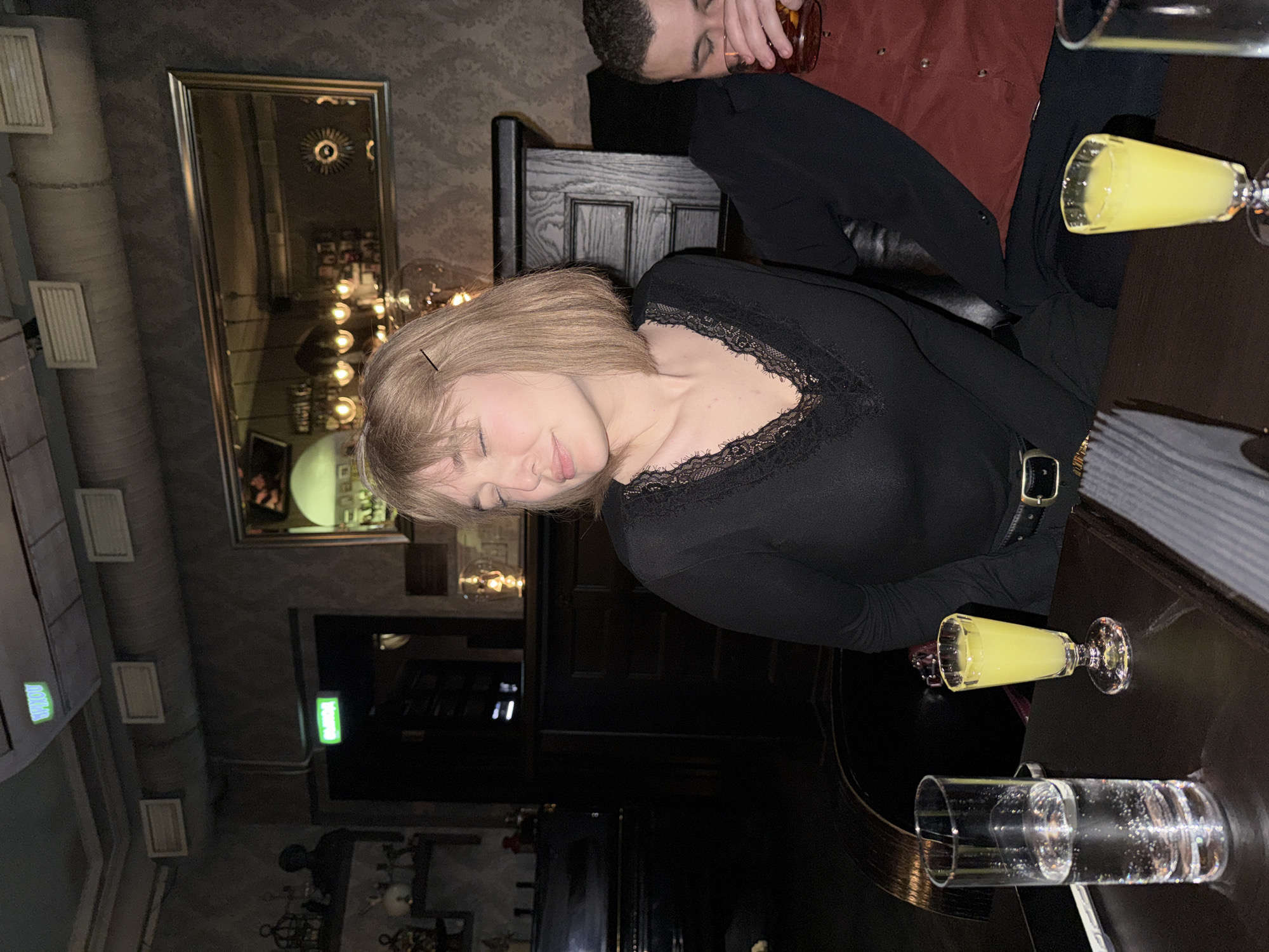 Late night social gathering captured at Moscow bar
