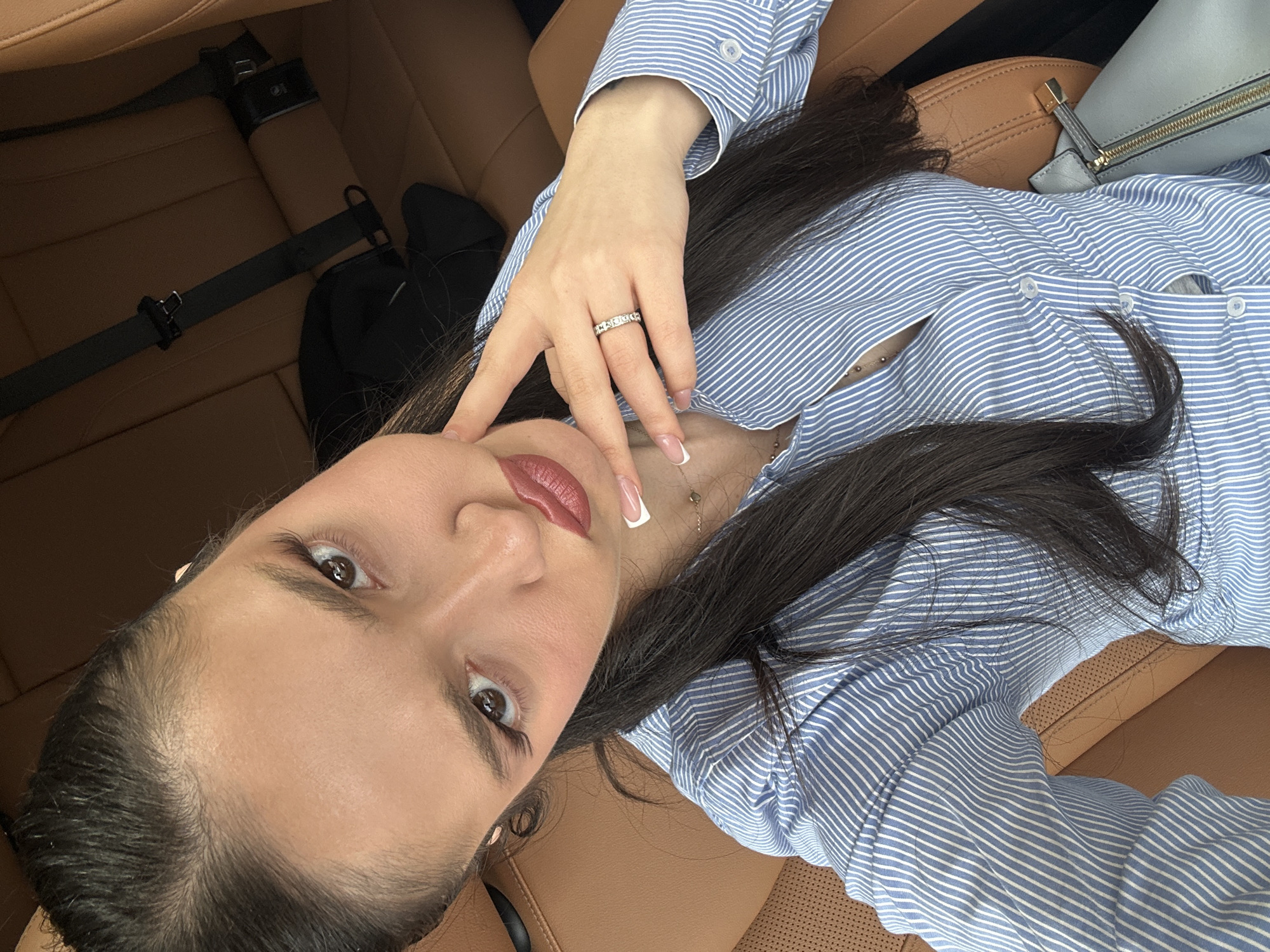 Woman photographed resting in vehicle in Yerevan