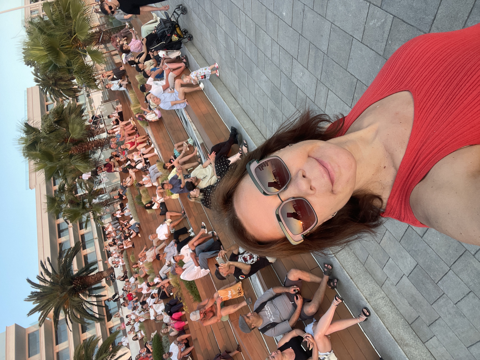Sunset hour on Sochi's Black Sea beach, people out in force