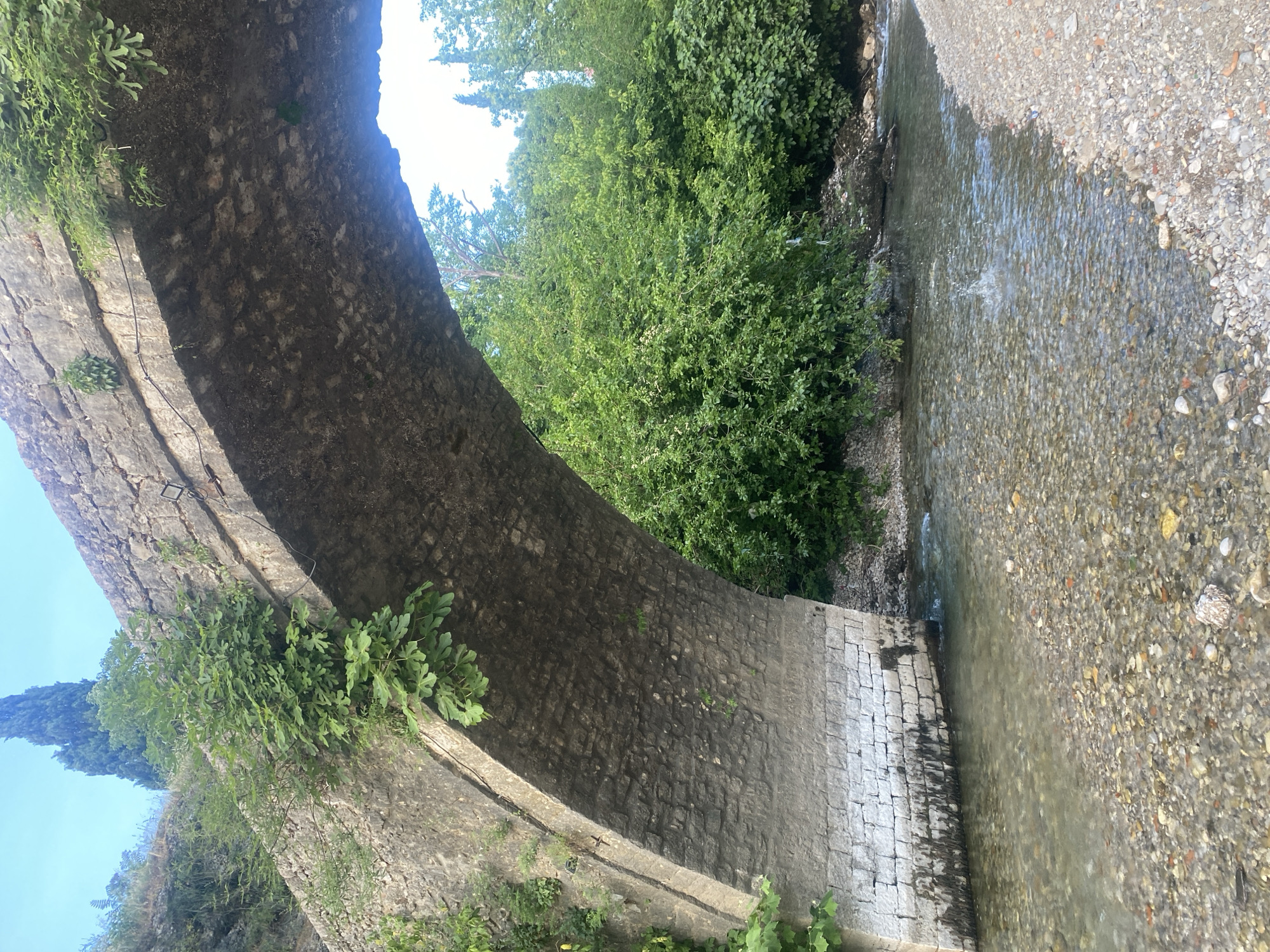 Historic stone bridge documented along Podgorica riverbank
