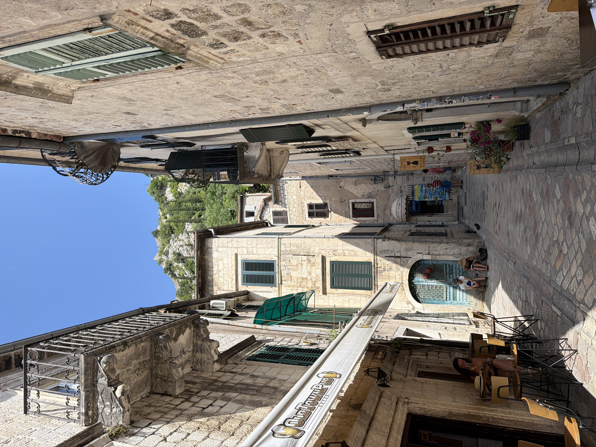 Daily life documented in Kotor's historic stone streets