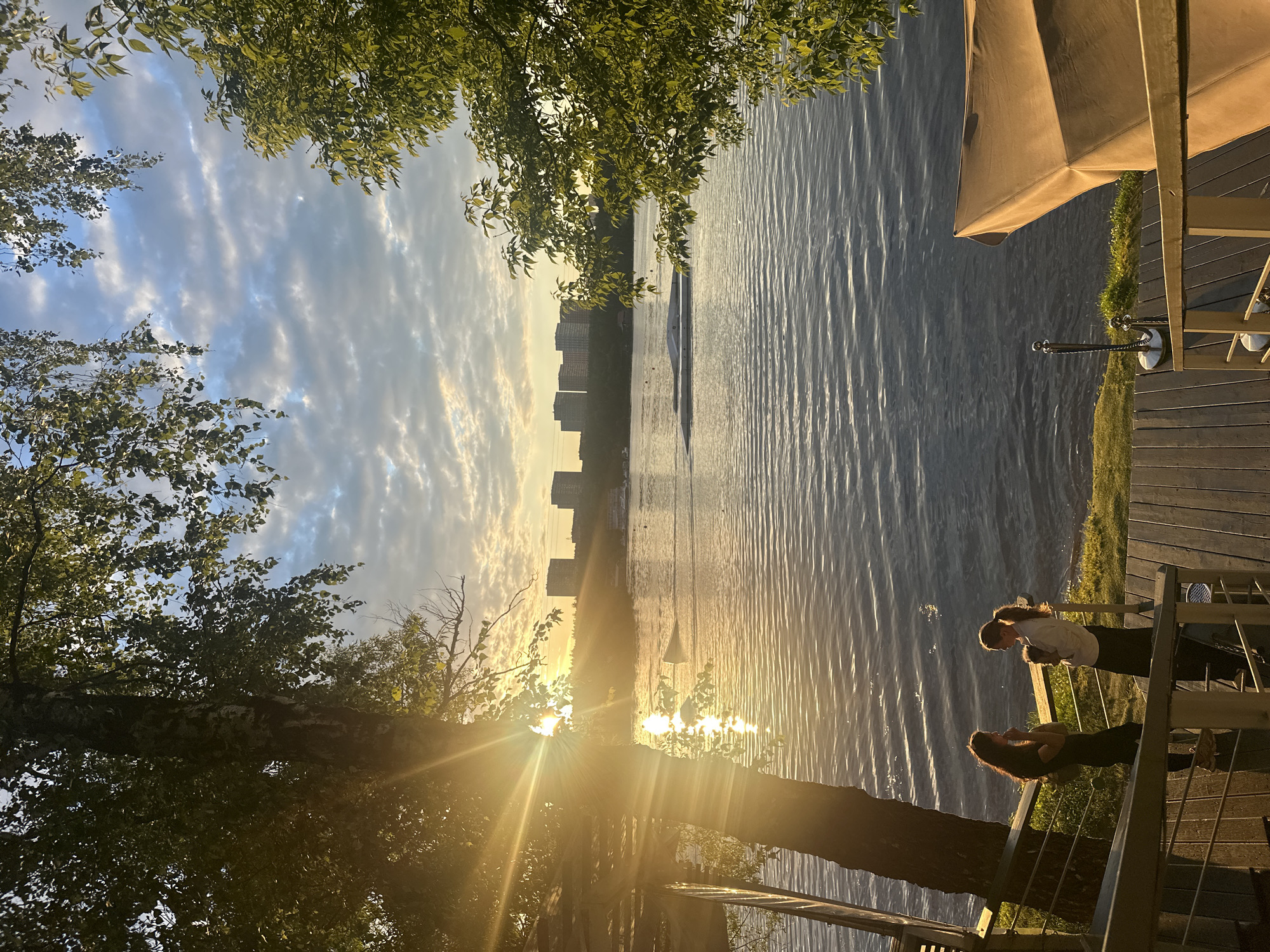 Sunset evening at a Moscow lakeside café and waterfront