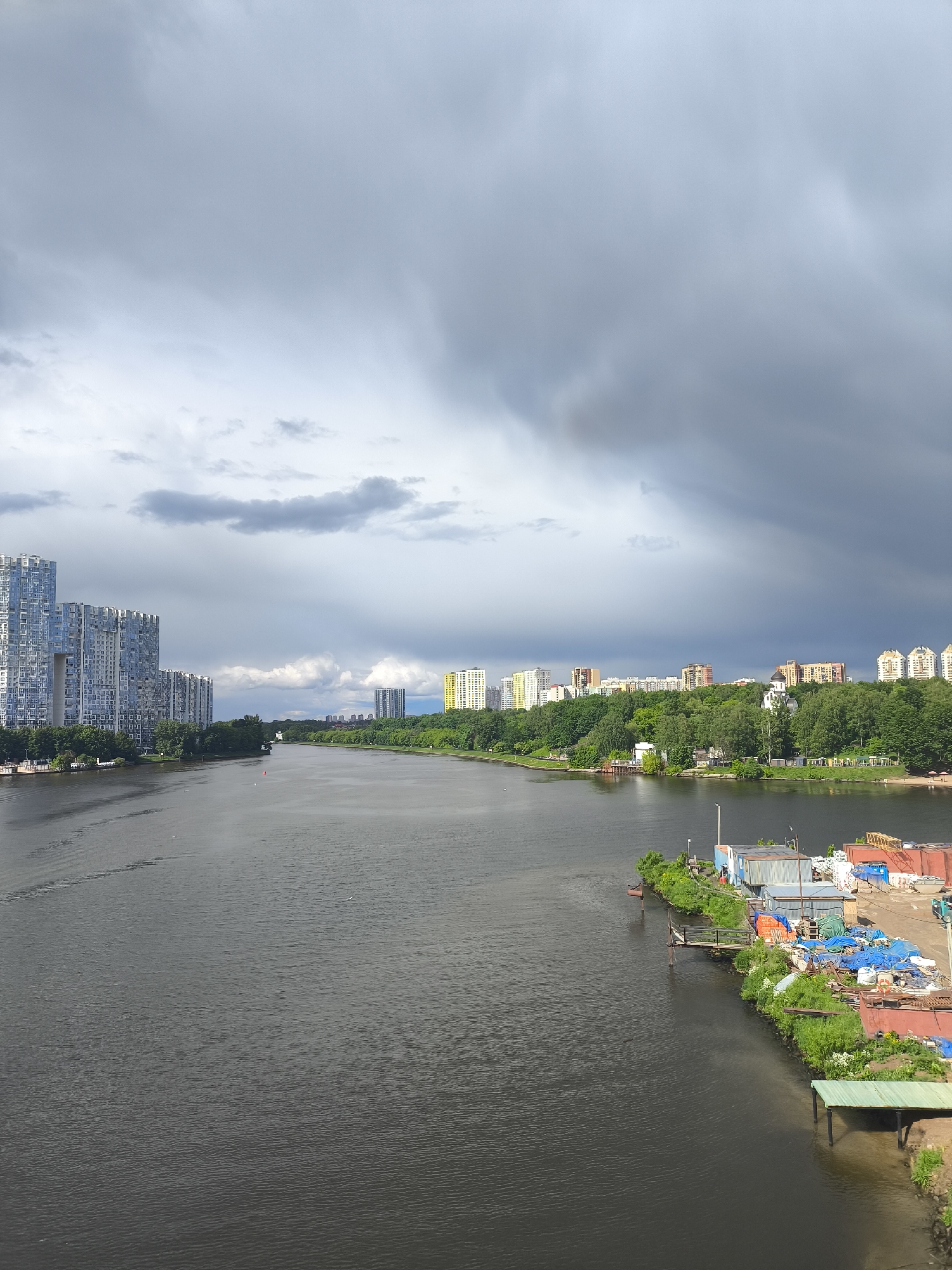 Urban transit station and river documented during storm
