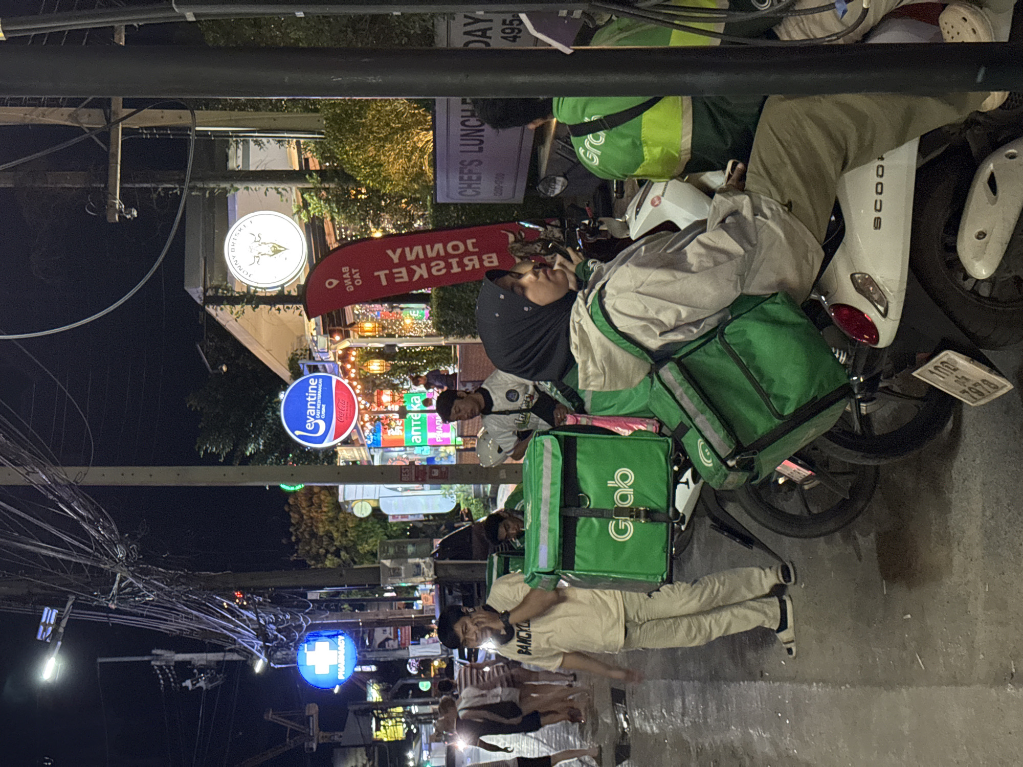 Dinner and street life in Choeng Thale on a July night
