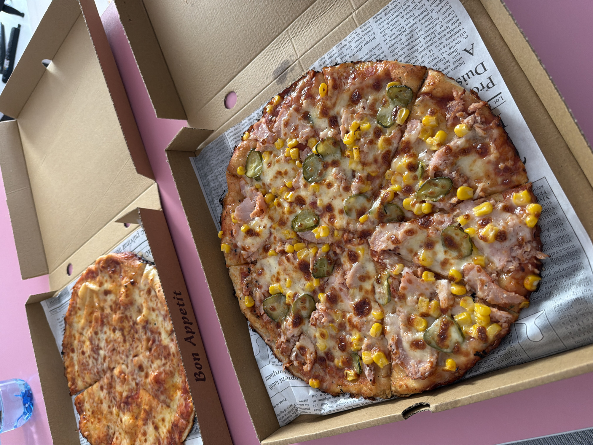 Pizza takeout meal documented in Sofia during afternoon hours