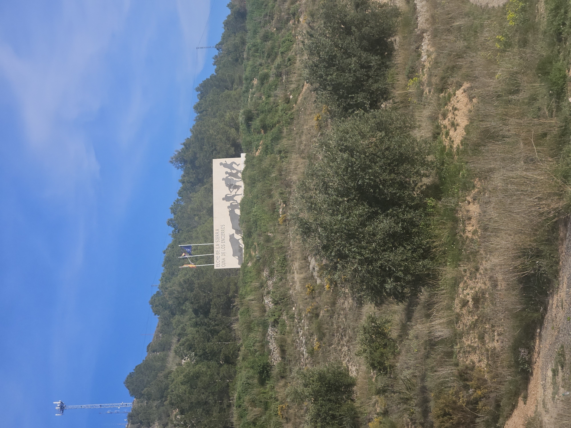 Monument with running figures spotted on Spanish hillside