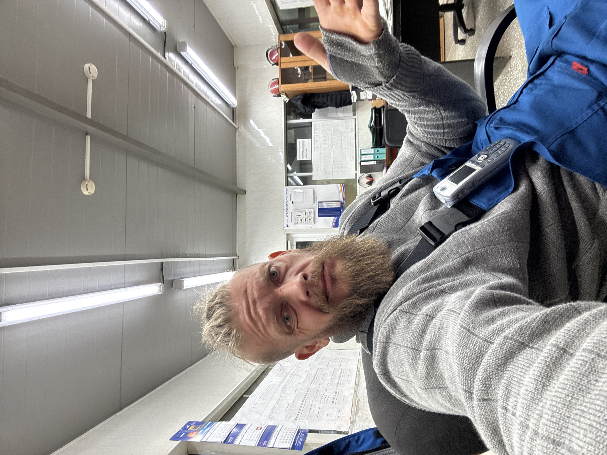 Worker with radio observed in office setting