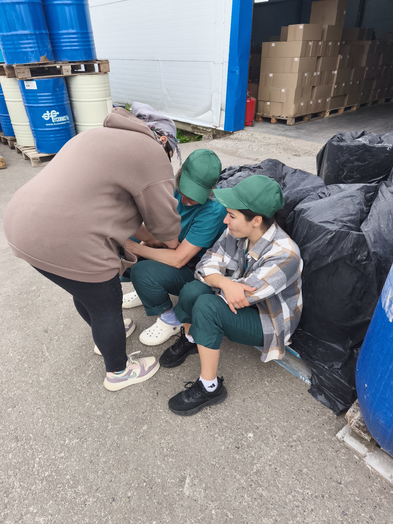 Daily life moments captured in Сокуры: street gathering, factory work