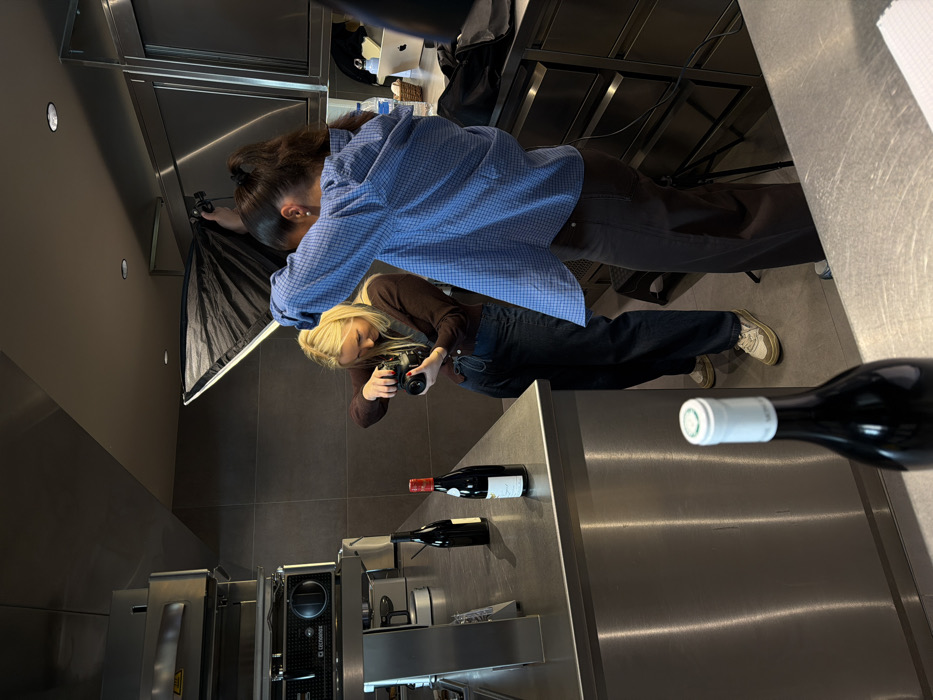 Wine photography session documented at Belgian restaurant