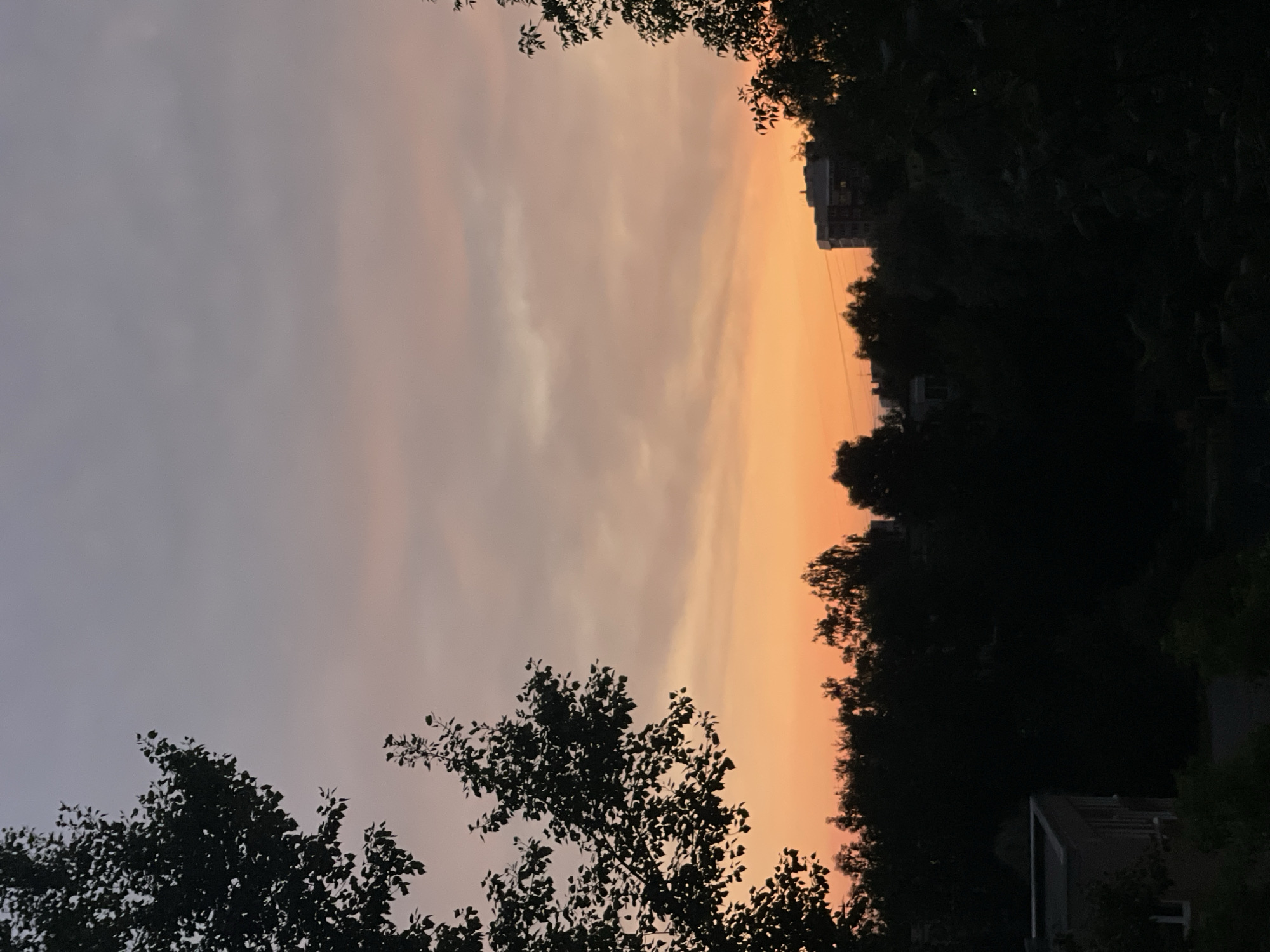 Saint Petersburg's summer sky fading through orange and purple