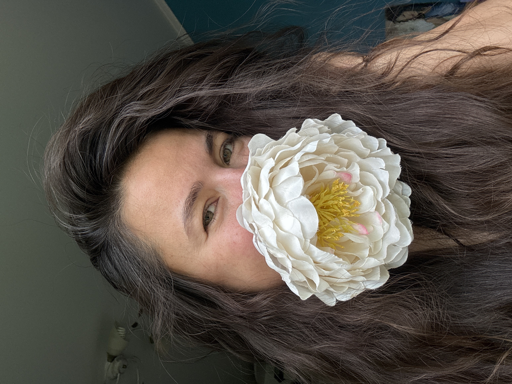 Woman photographed with artificial flower in Kazan