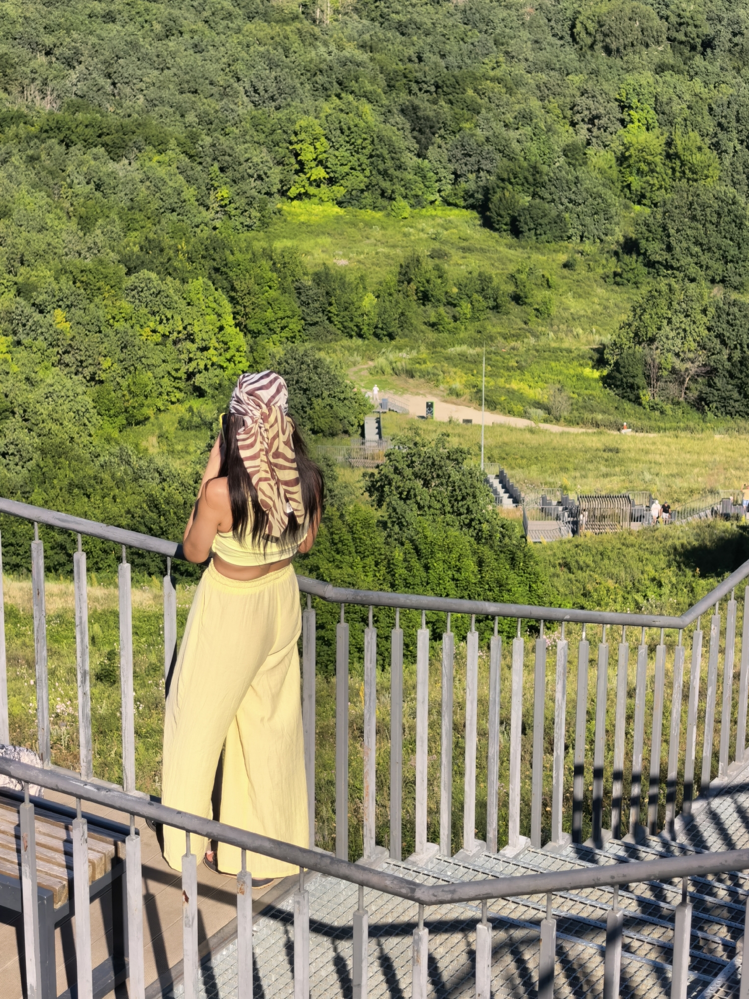 Sunny hilltop staircase visit with panoramic rural views in Akhmerovo