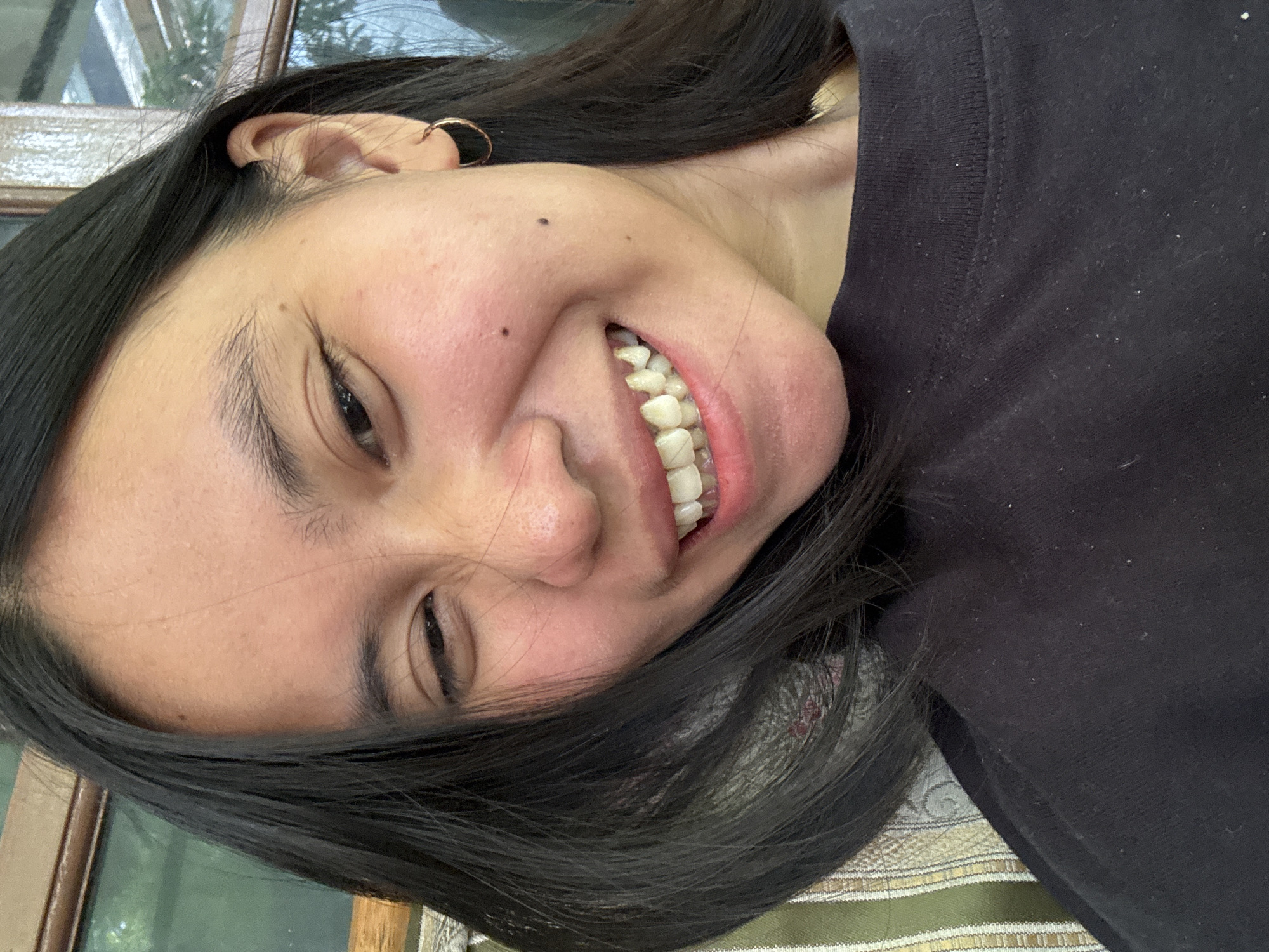 Selfie session on a patterned sofa in South Jakarta