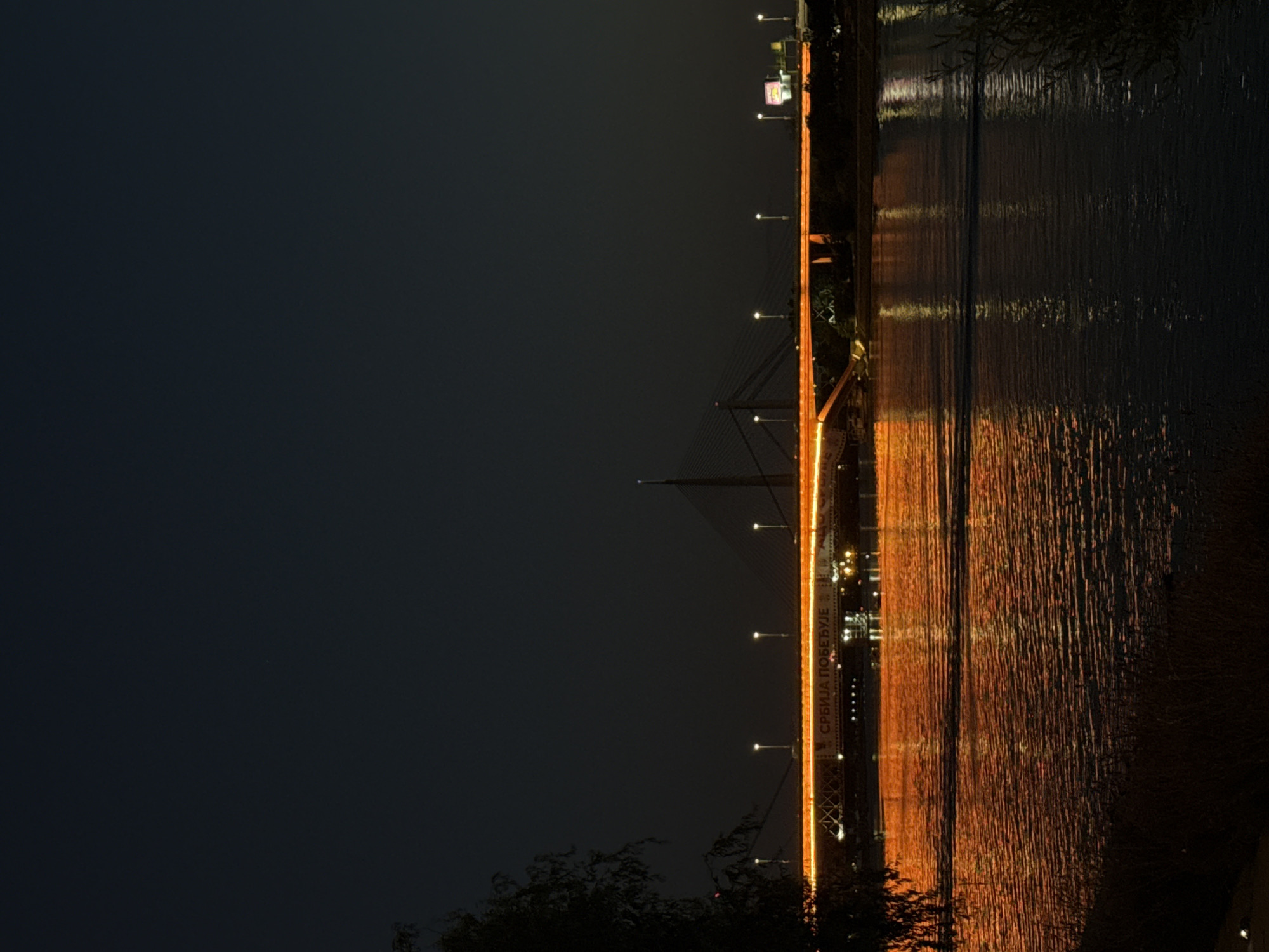 Belgrade's Ada Bridge and Waterfront glow on a July night