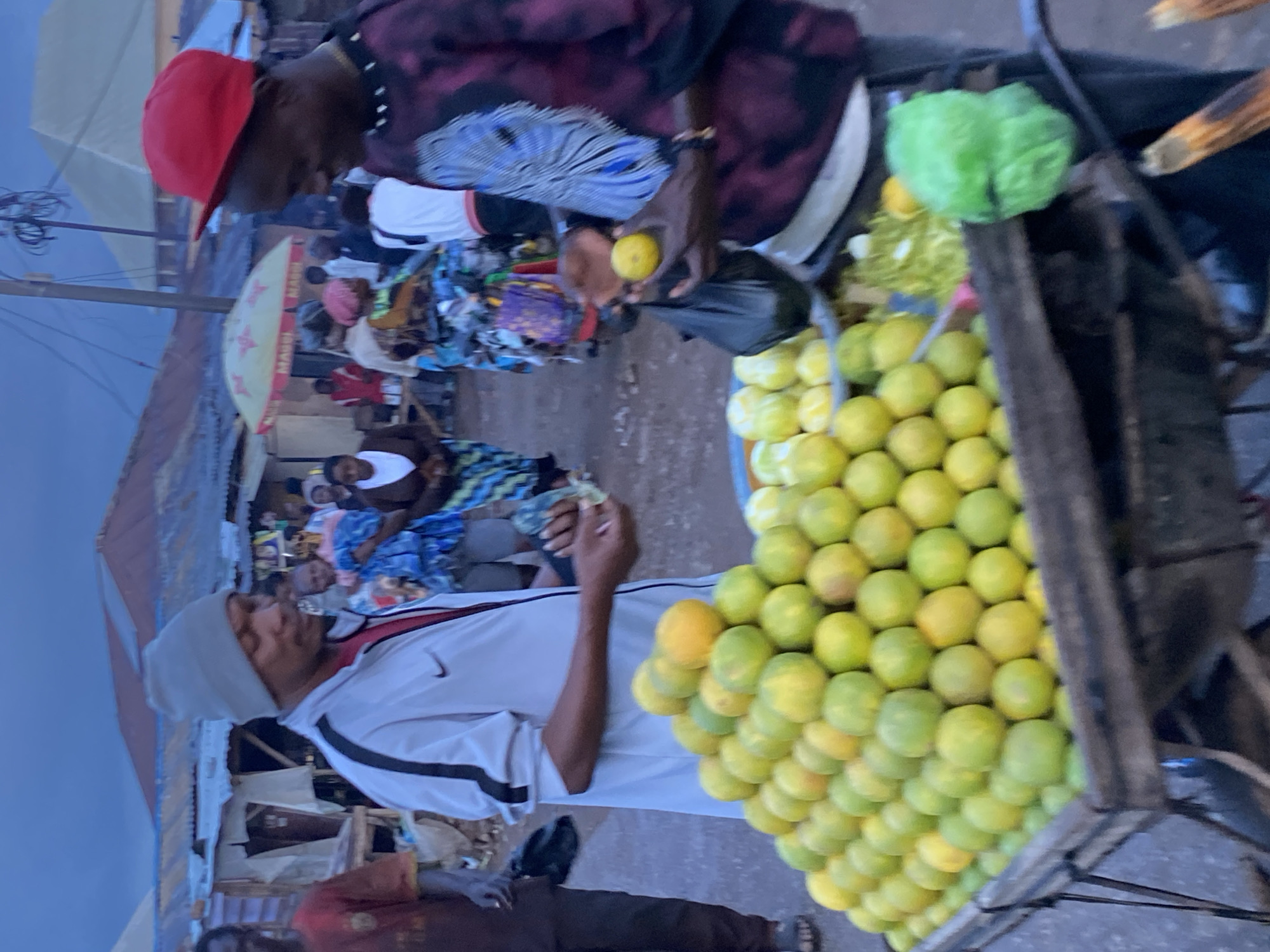 Street life and trade moving through Bukuru, Nigeria