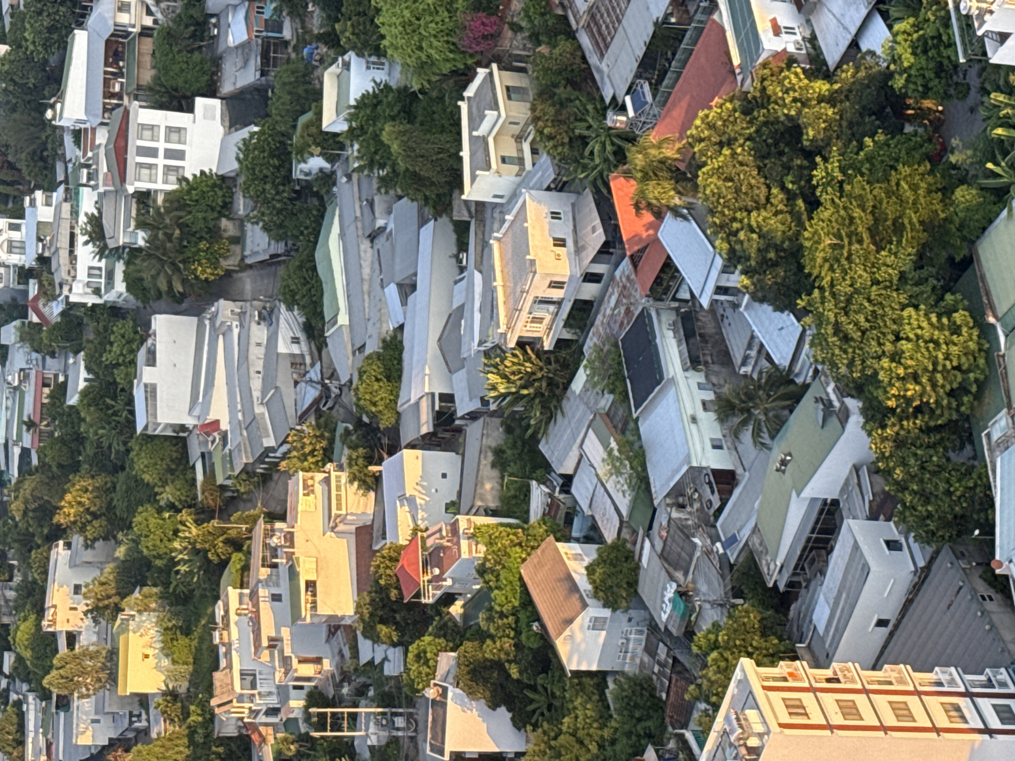 Nha Trang at sunset, city and mountains from above