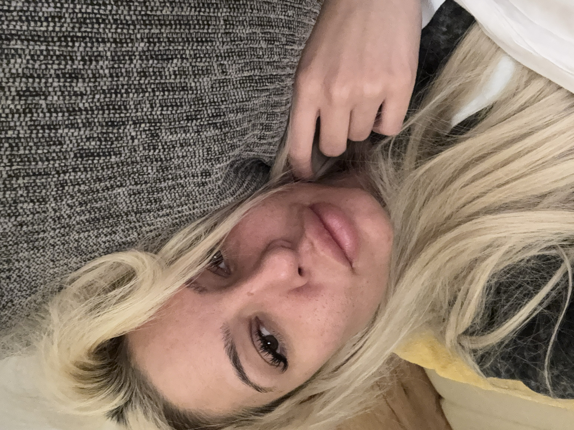 Woman photographed in casual bedroom moments in Sofia