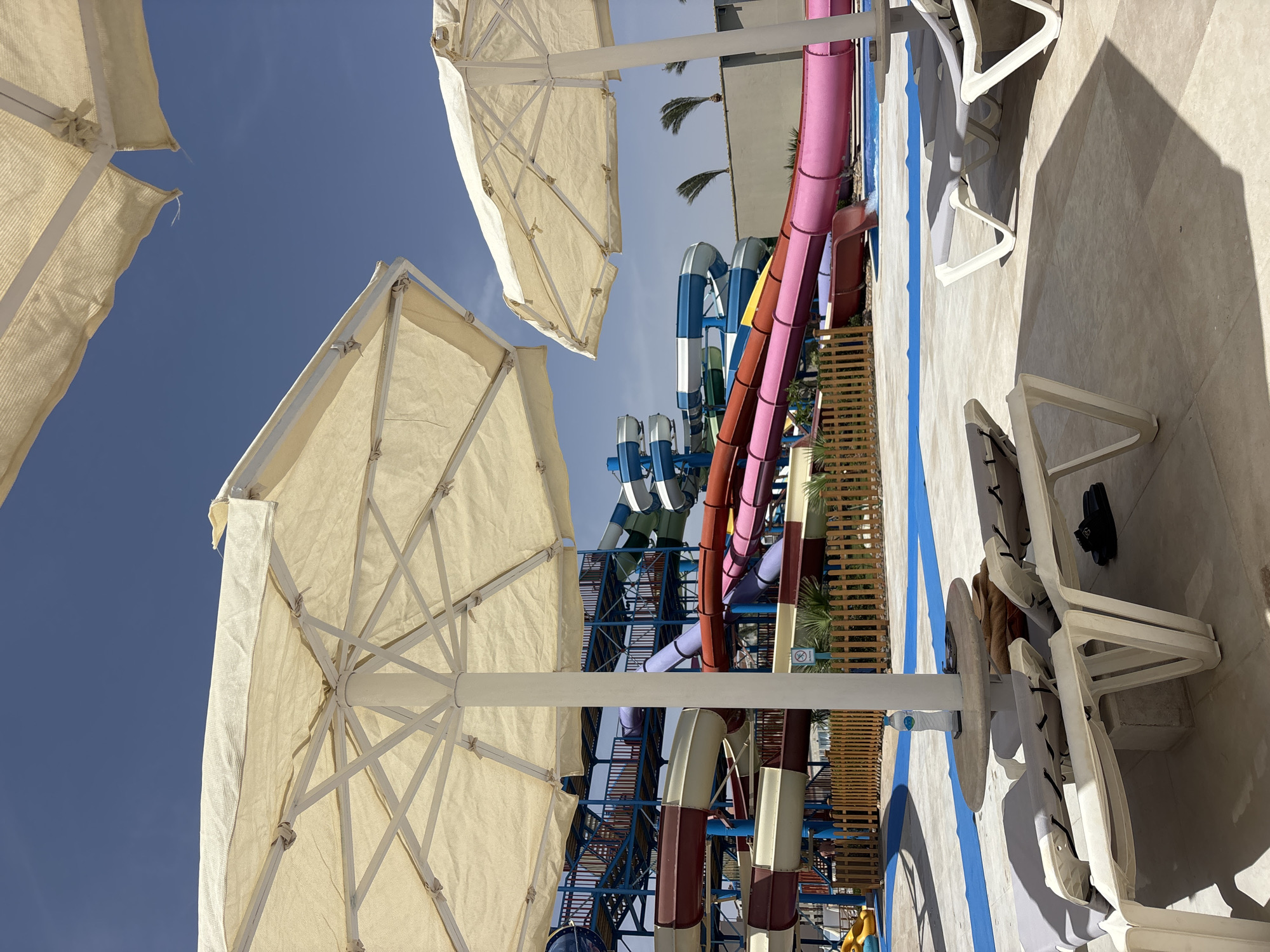 Water park with colorful slides documented in Al Ahia', Egypt