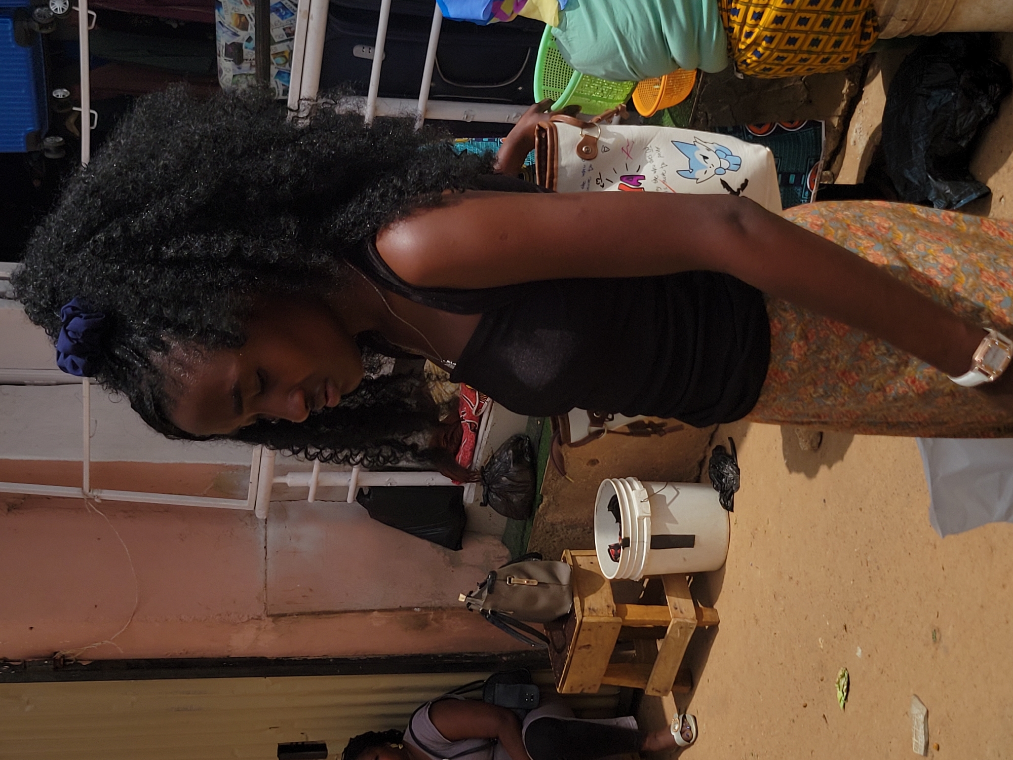 Women shop at outdoor market in Jos, Nigeria