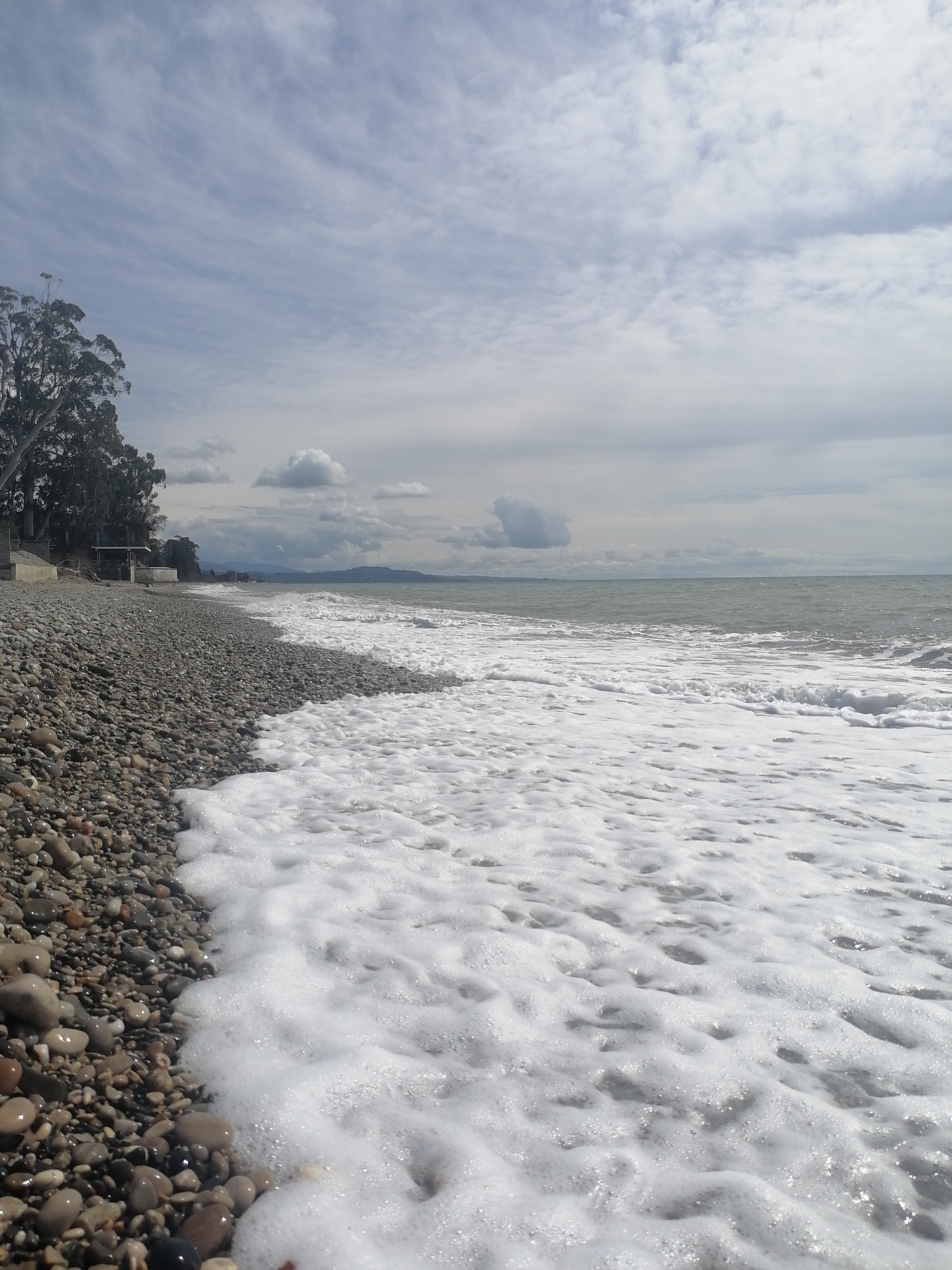Morning waves documented at New Athos pebble beach