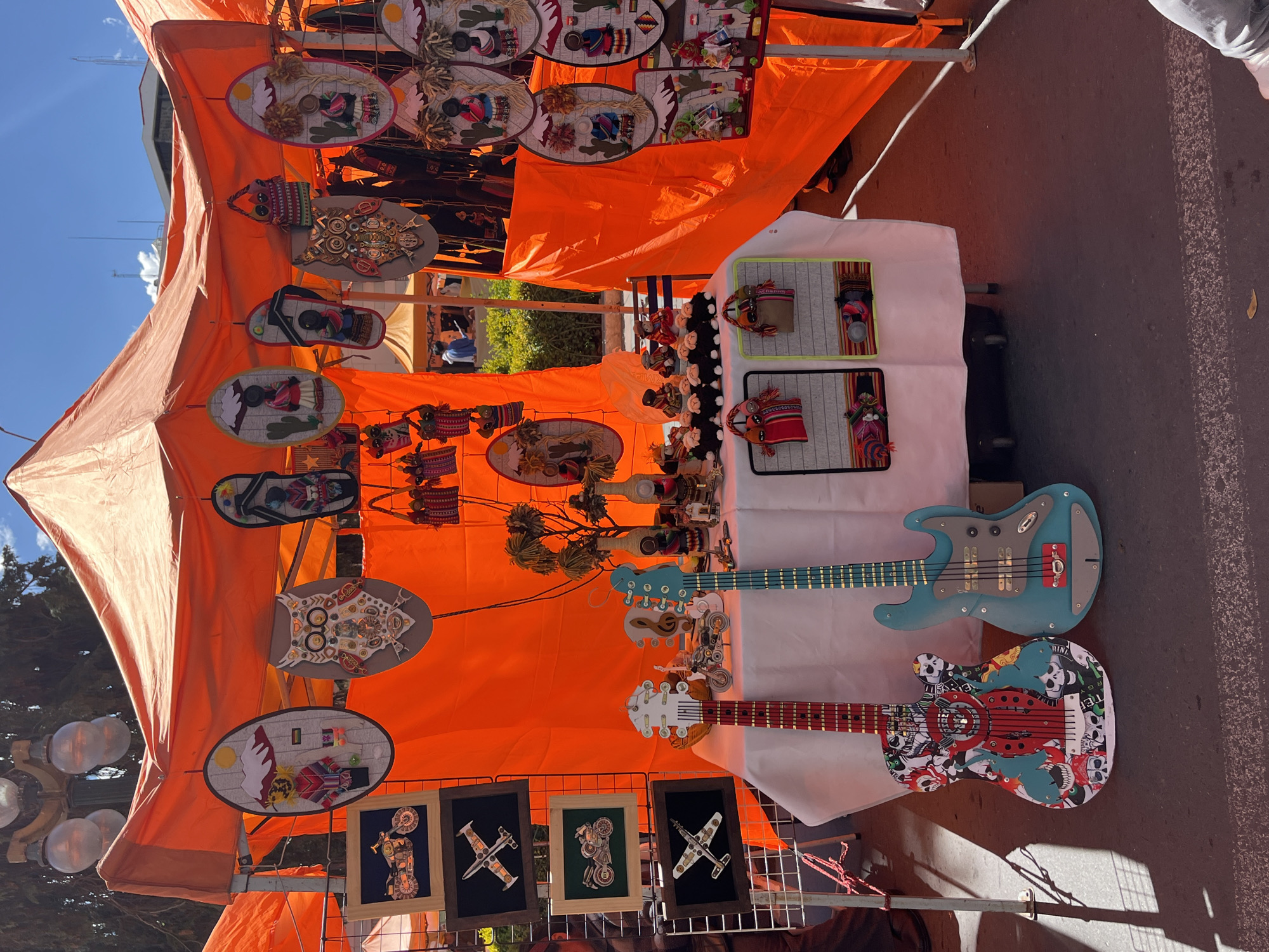 Street vendors and shoppers active in La Paz market district