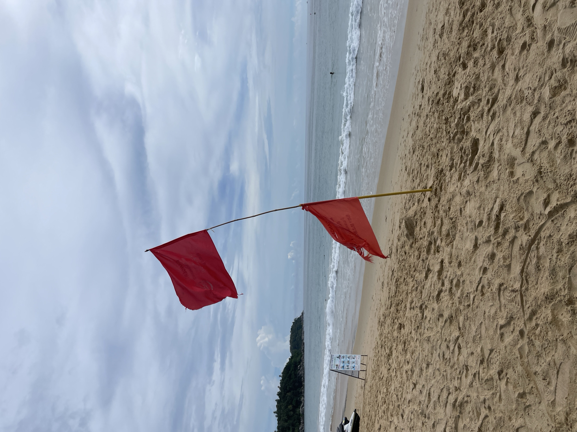 Karon Beach scenes show red flags, inflatables, vendors