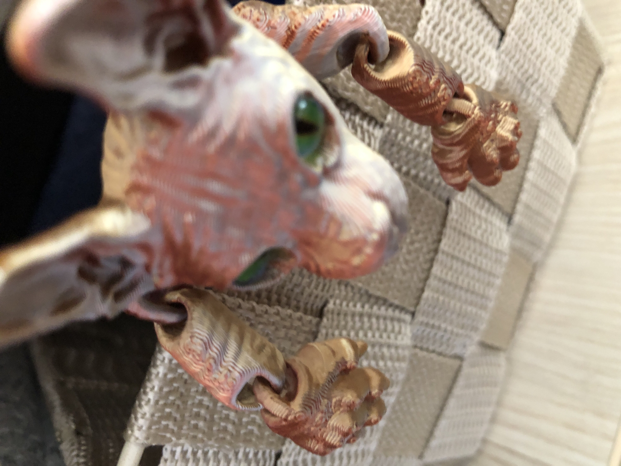 Close-up shots of handmade figures, tins, and a morning drink