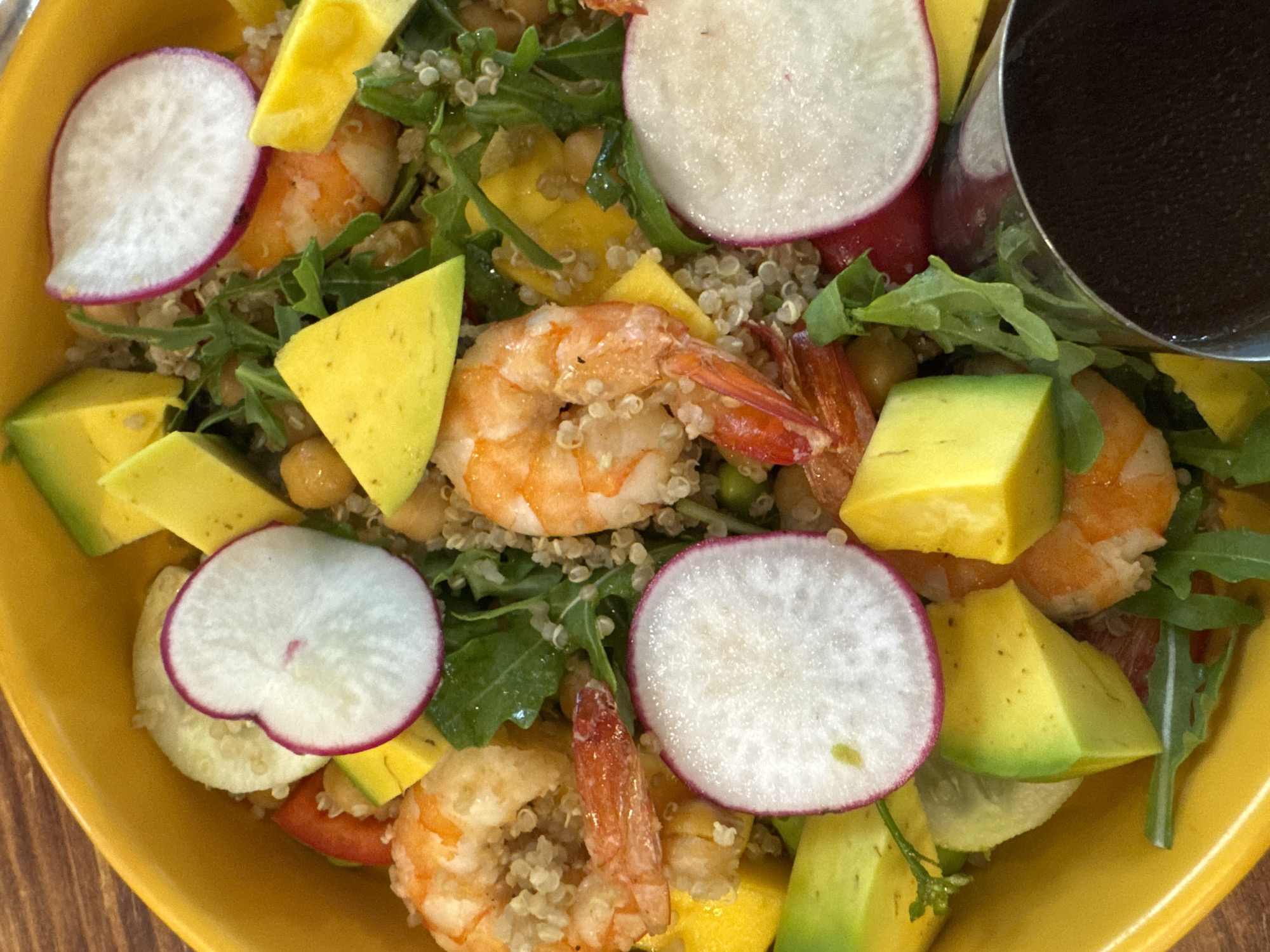 Shrimp and mango quinoa salad in a yellow bowl, Đà Nẵng