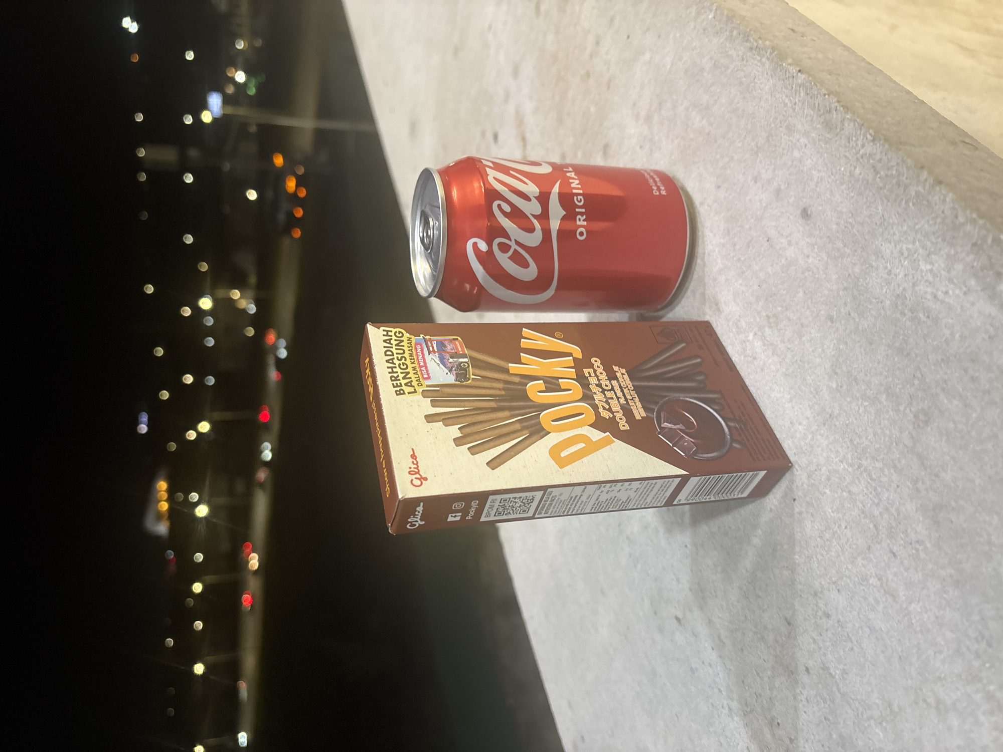 Snacks photographed on concrete surface in Yerevan at night