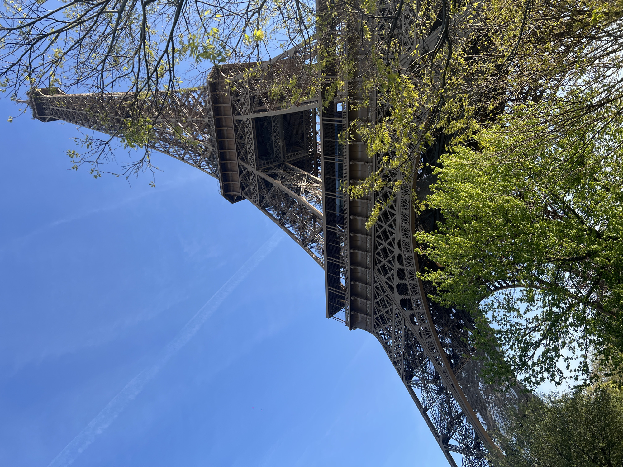 Morning view of Eiffel Tower captured against blue sky