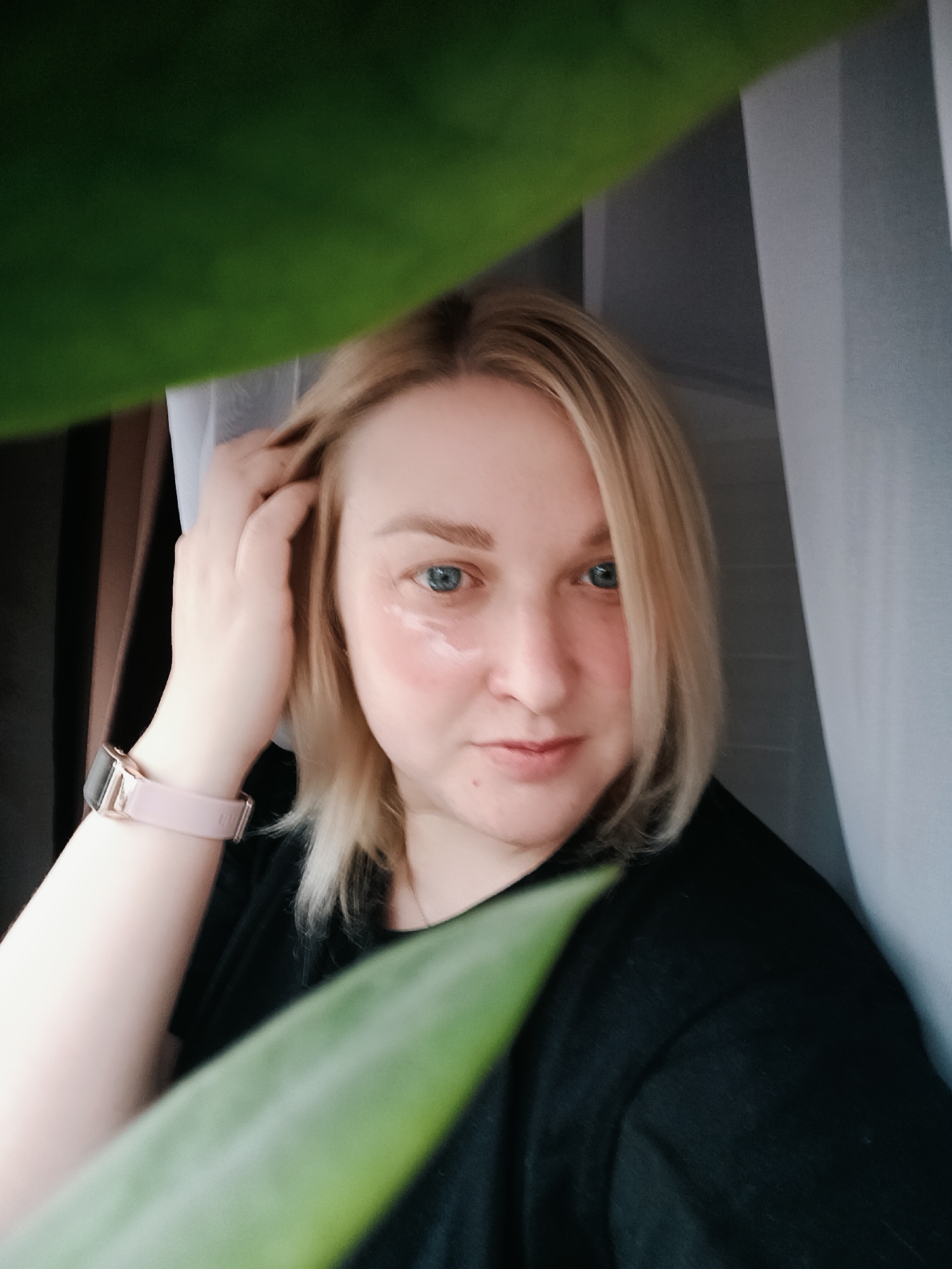 Woman takes selfies in Chaikovsky, Russia early morning